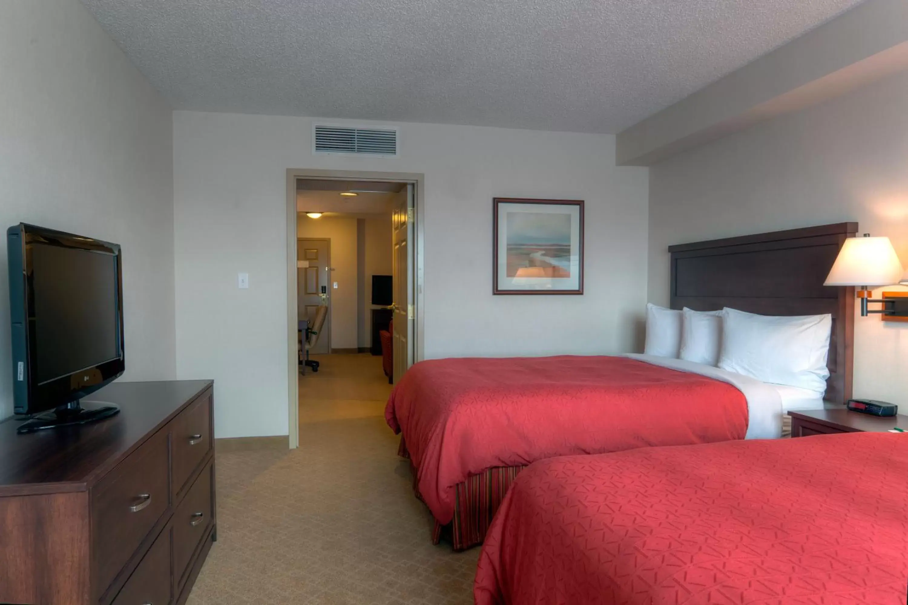 Bedroom, Bed in Country Inn & Suites by Radisson, Calgary-Northeast