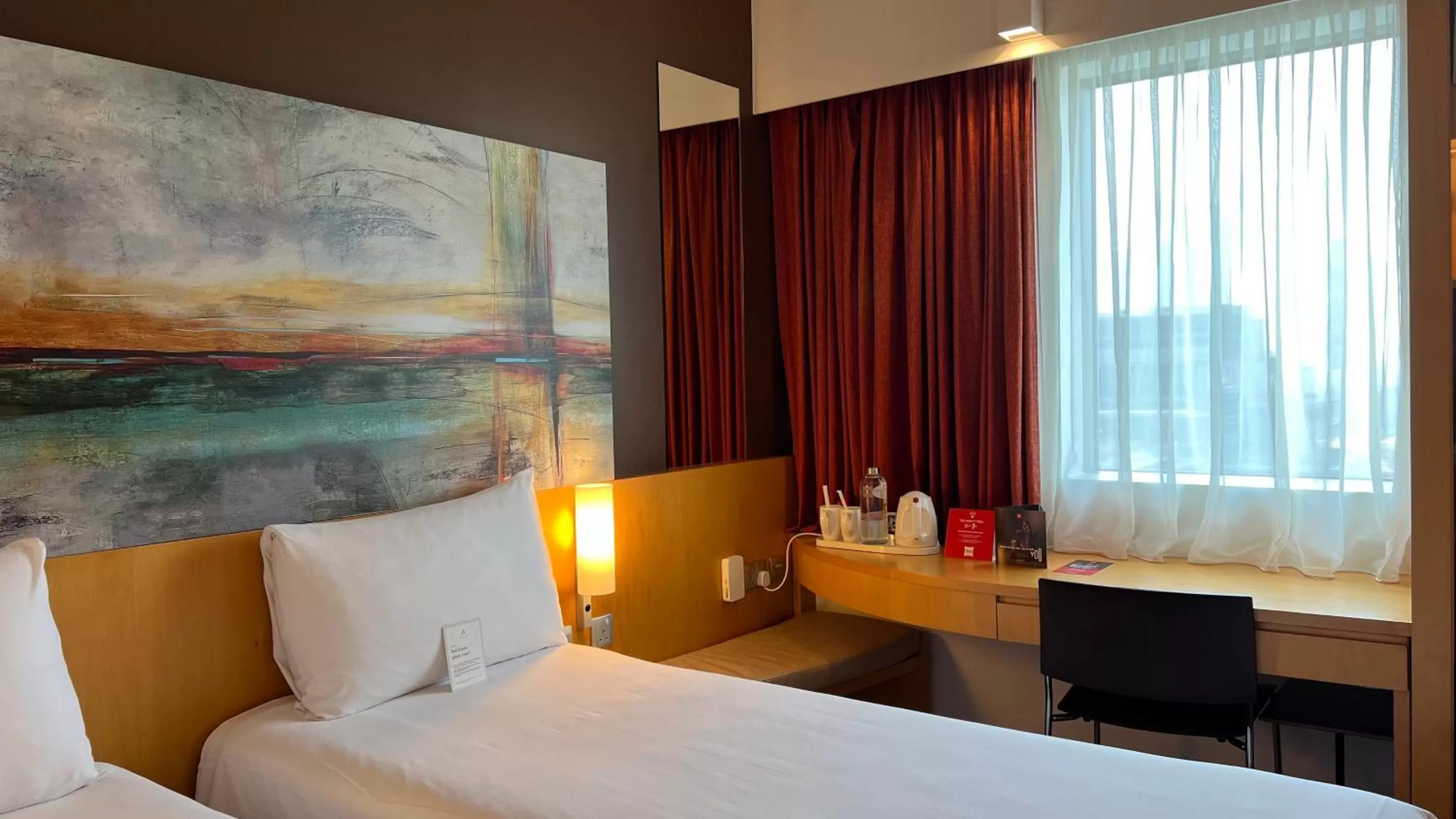 Seating area, Bed in ibis Dubai One Central