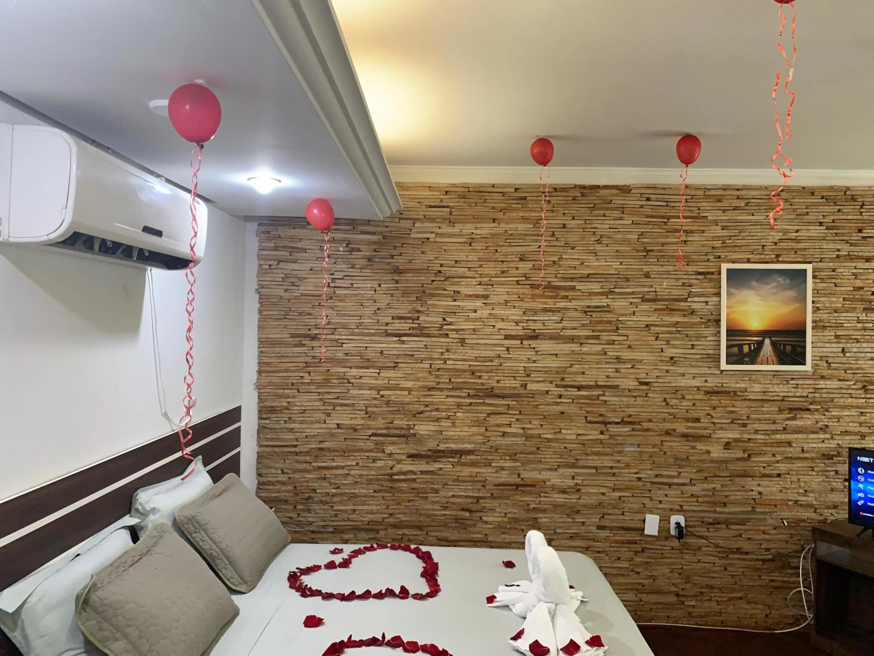 Bed in SAMIR HOTEL COMFORT