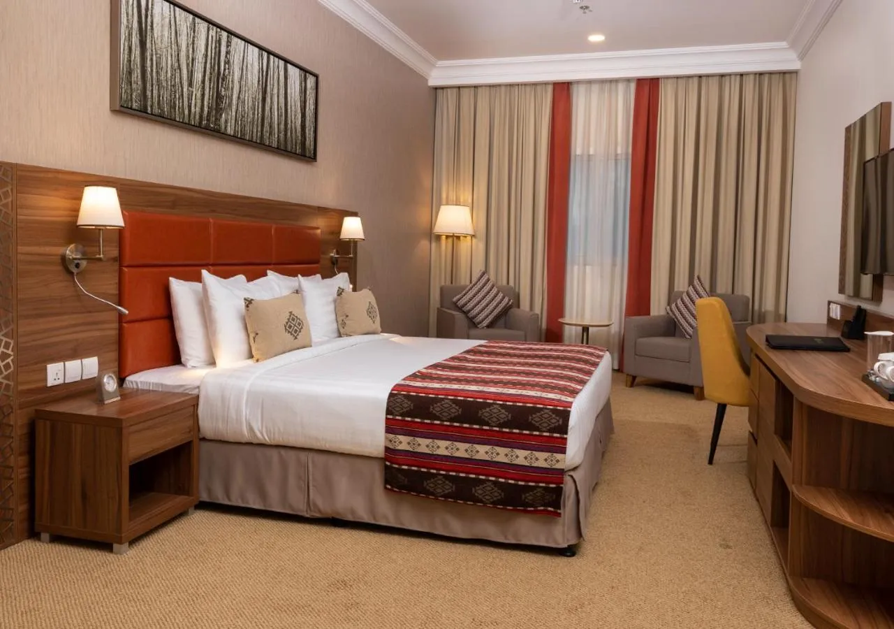 Bed in Jacob's Garden Hotel