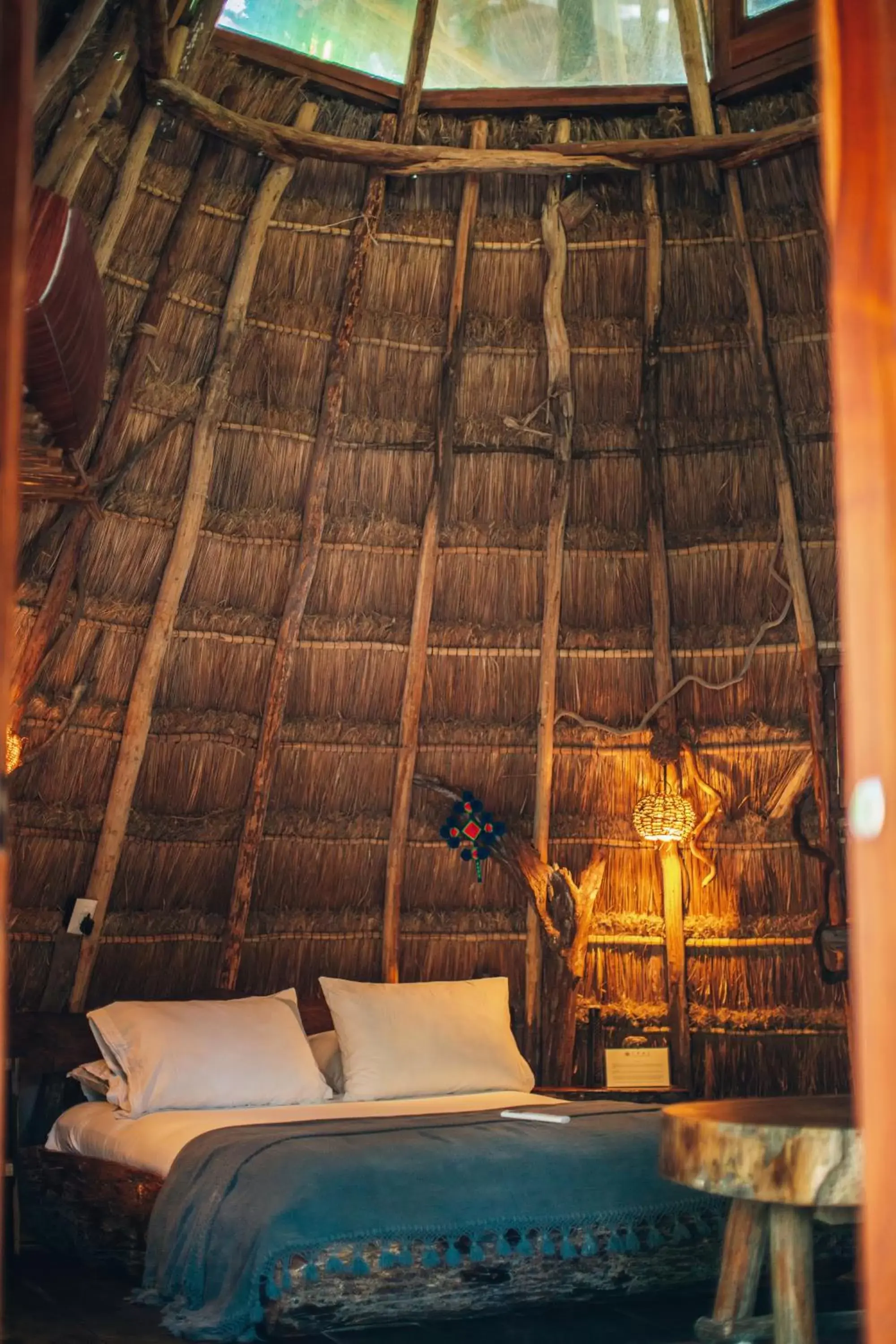 Bed in Ikal Tulum Hotel