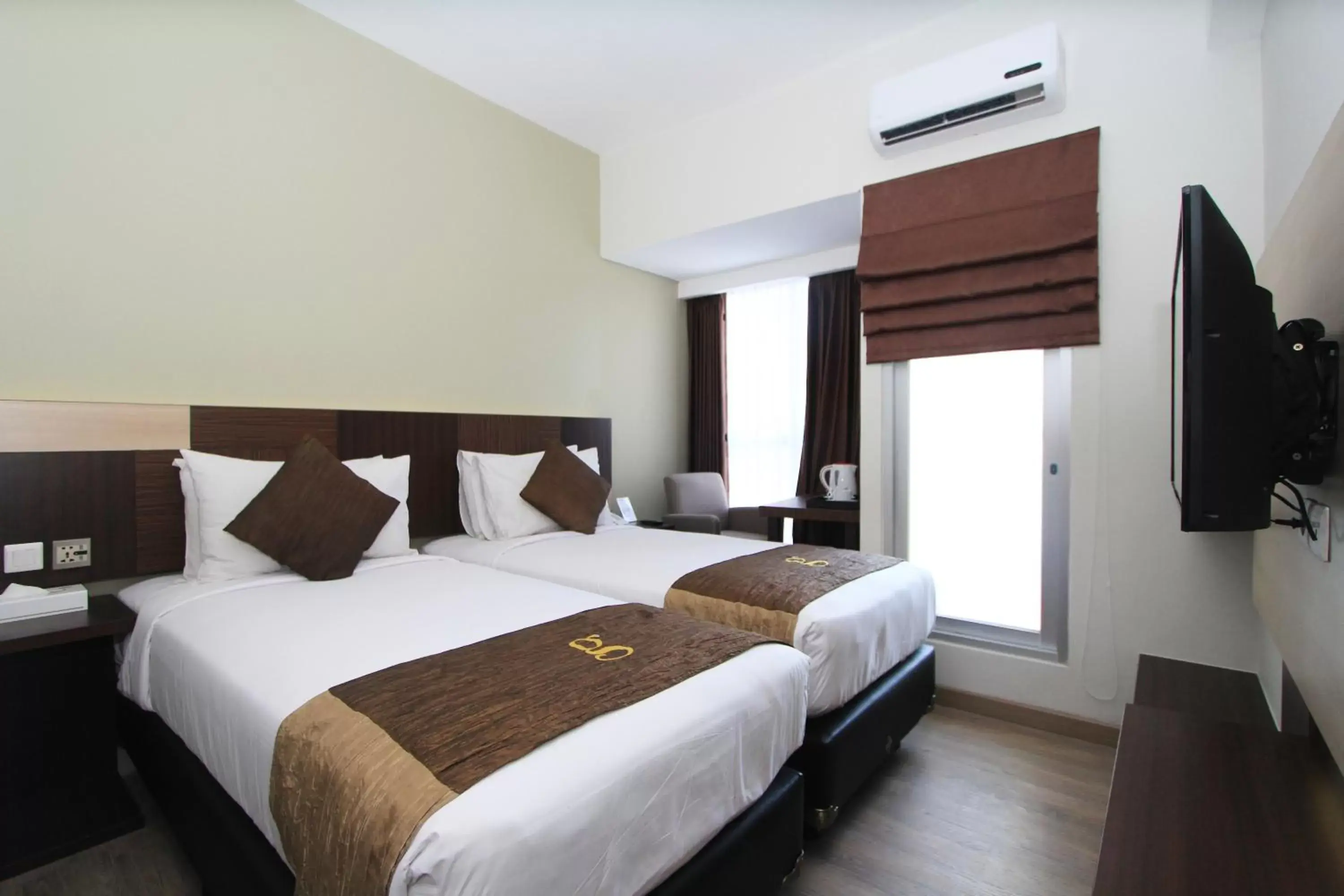 Bed in Hotel Gunawangsa MERR