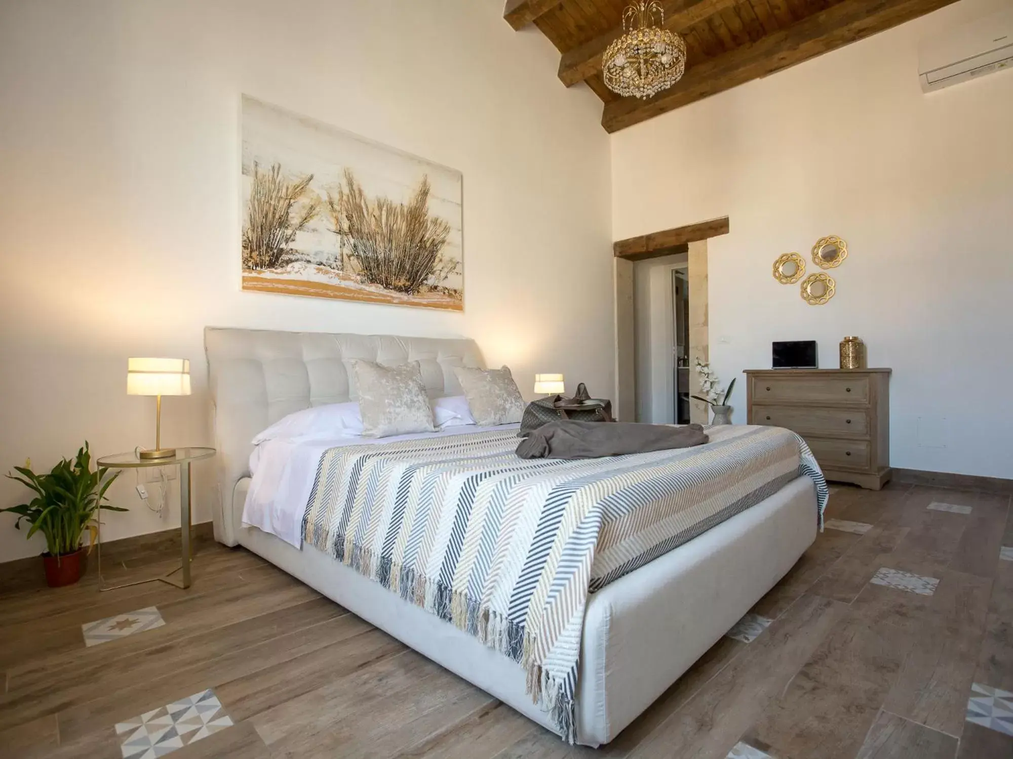 Bed in Ortigia Boutique Palace