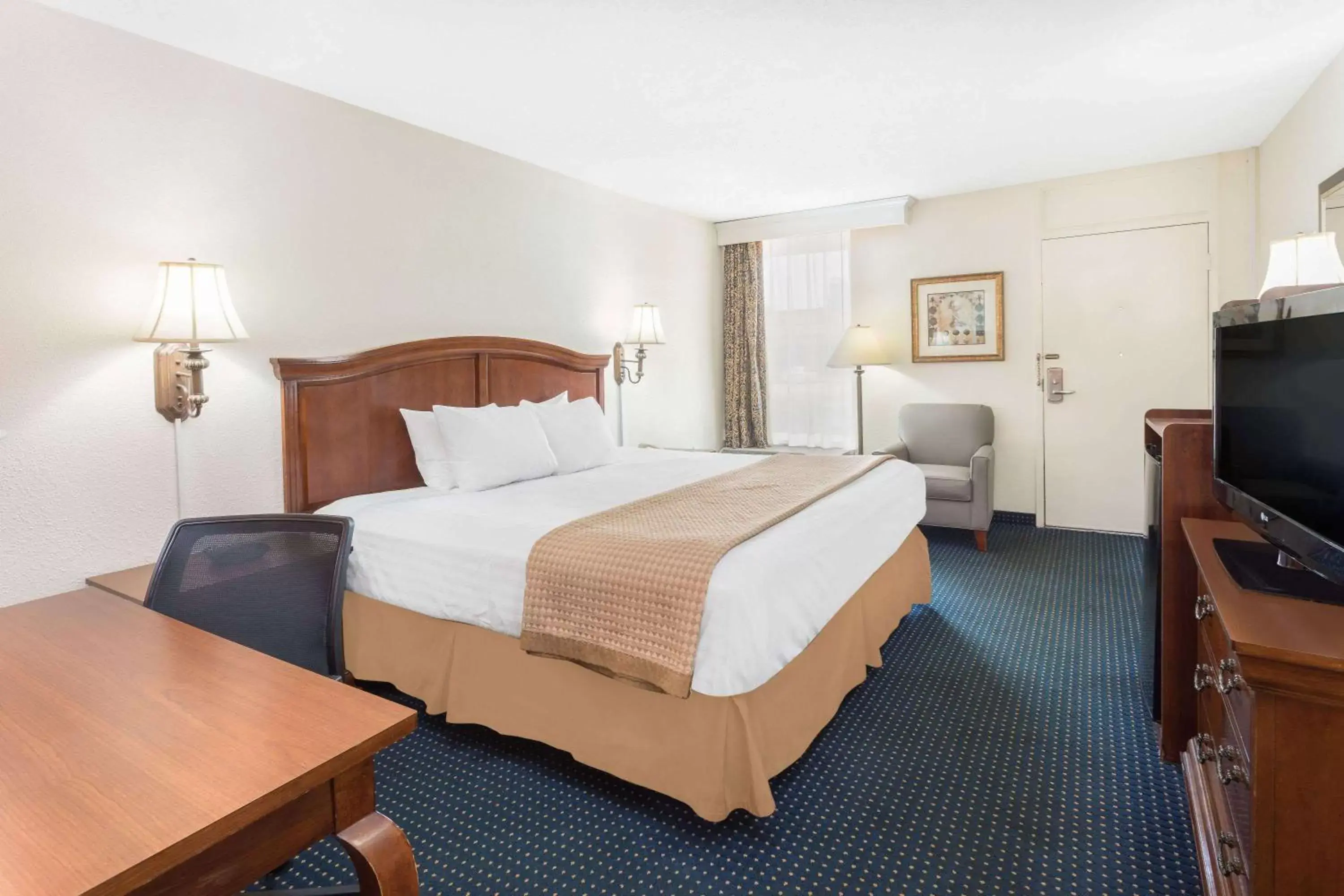 Photo of the whole room, Bed in Baymont by Wyndham Rocky Mount I-95