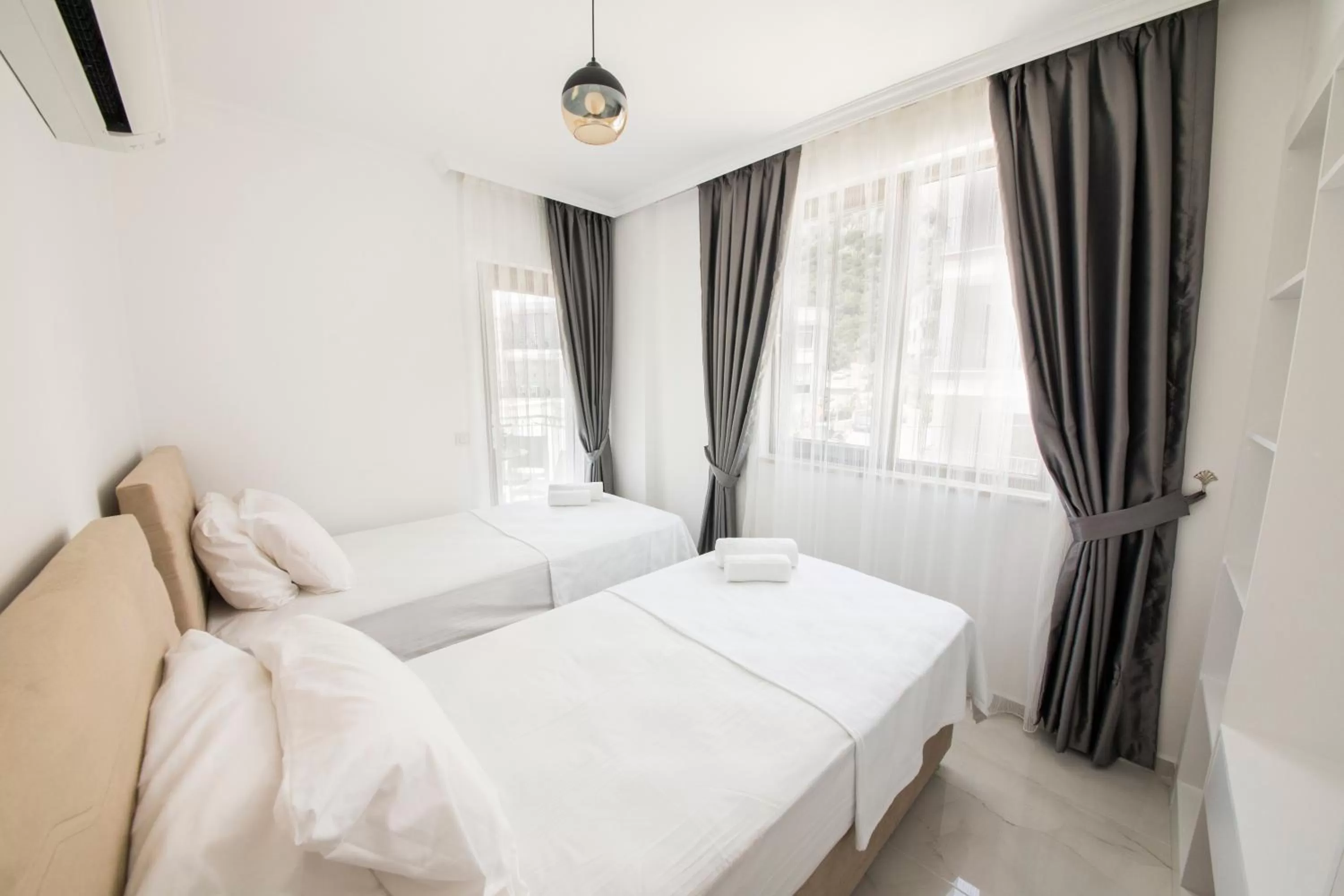 Bed in Cedrus Suites