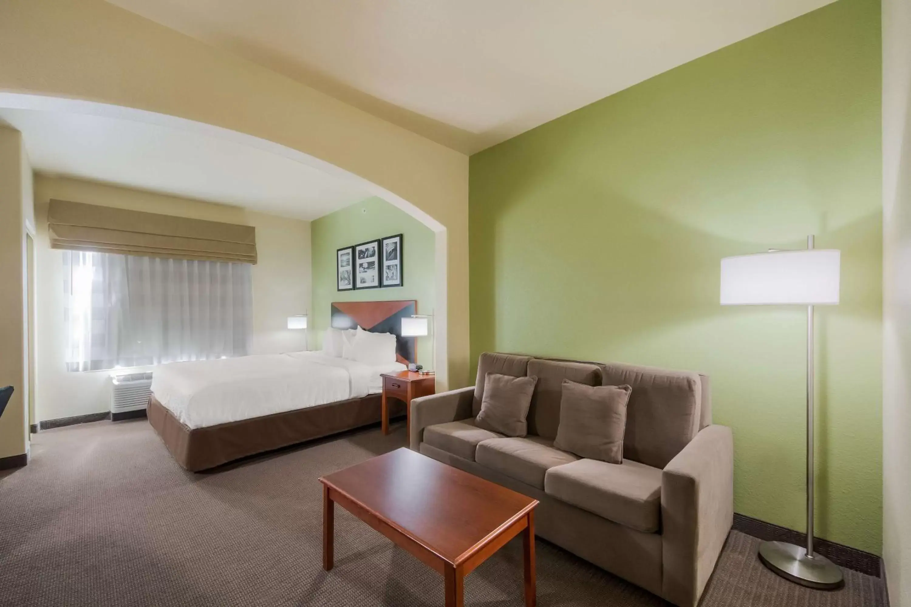 Bedroom in SureStay Plus Hotel by Best Western Near SeaWorld San Antonio