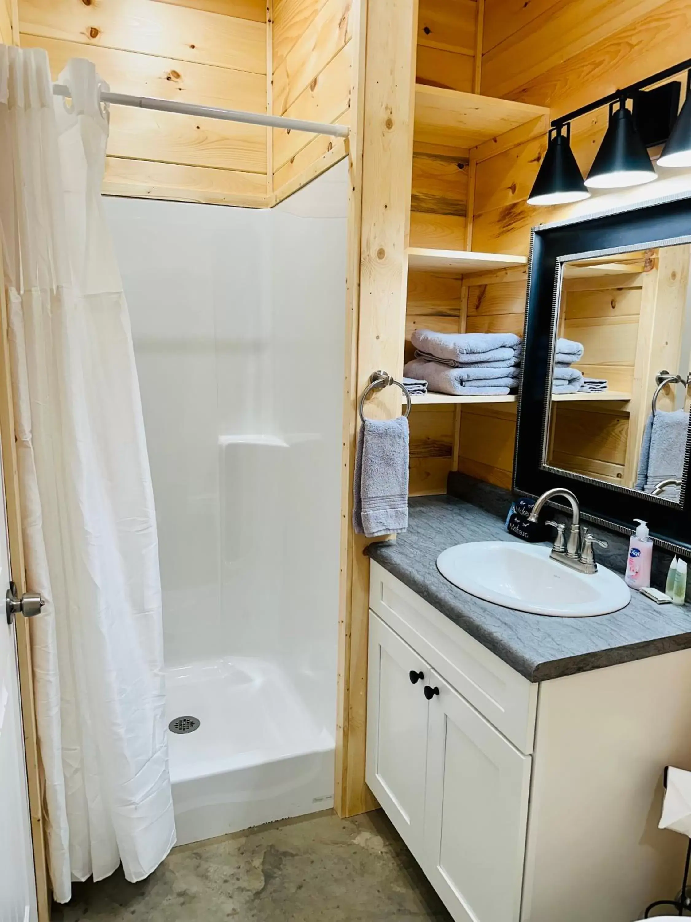 Shower, Bathroom in Knotty Squirrel Cabins