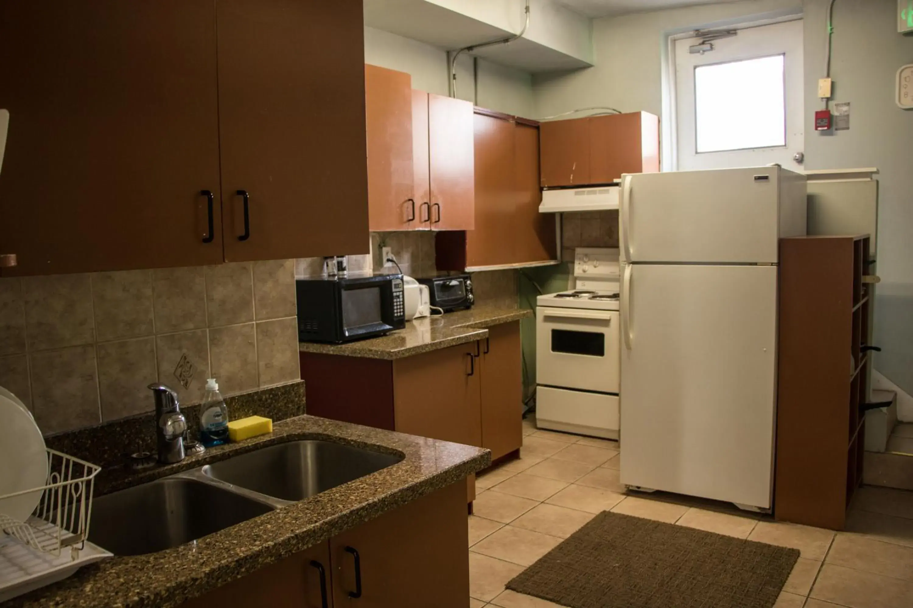 Kitchen/Kitchenette in Saint Lawrence Residences and Suites