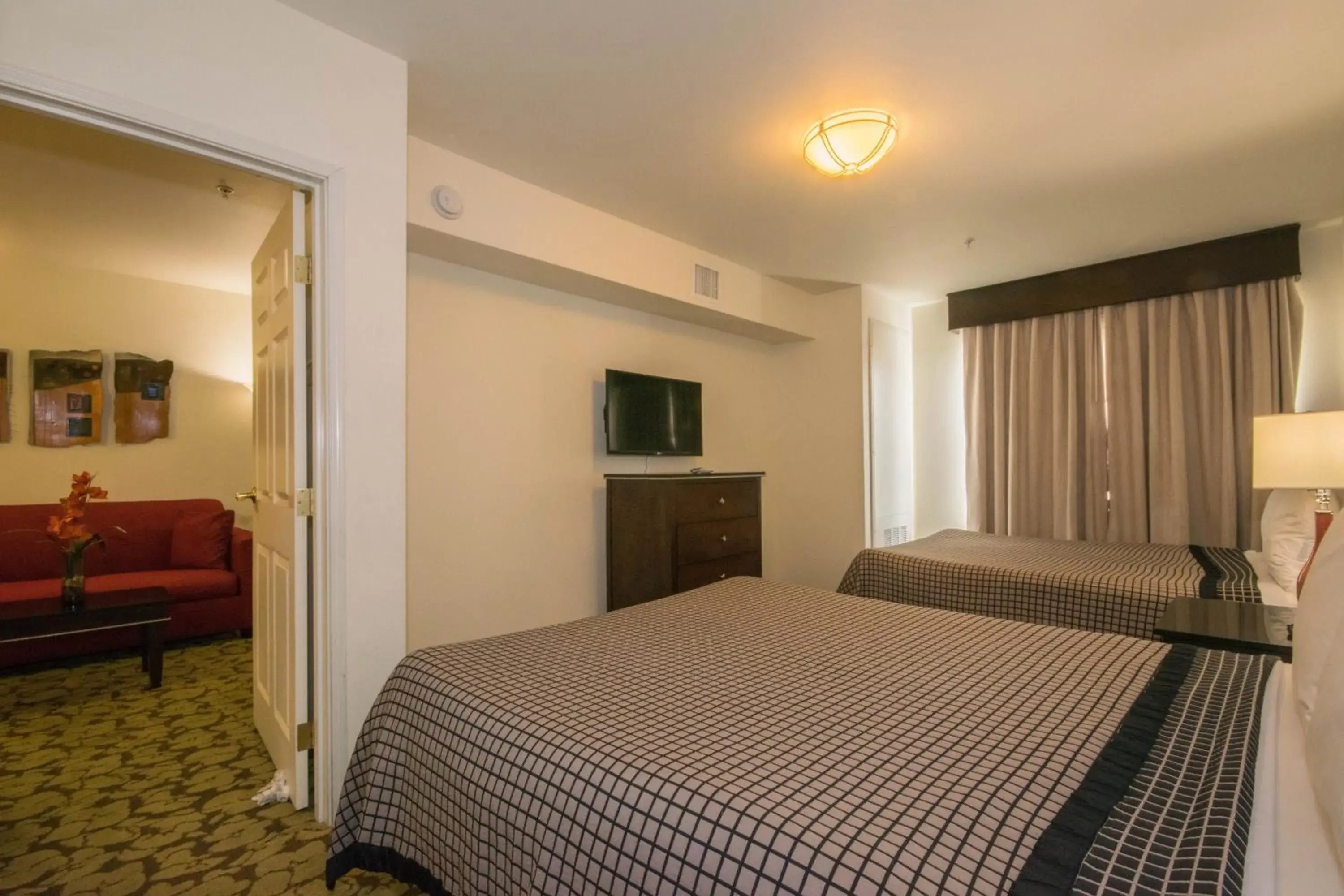 Bedroom, Bed in Hotel Extended Studio Inn