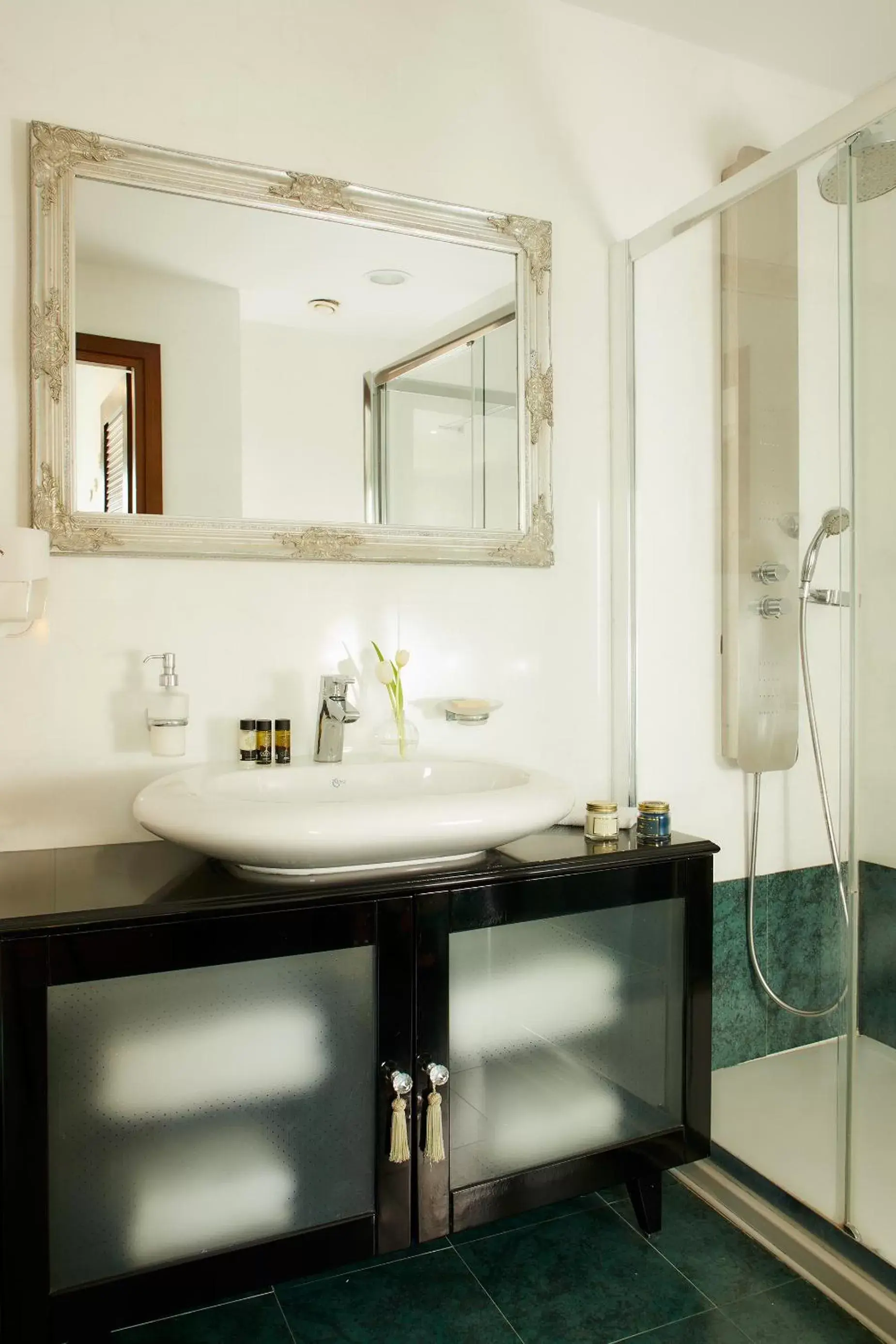 Bathroom in Dioni Boutique Hotel