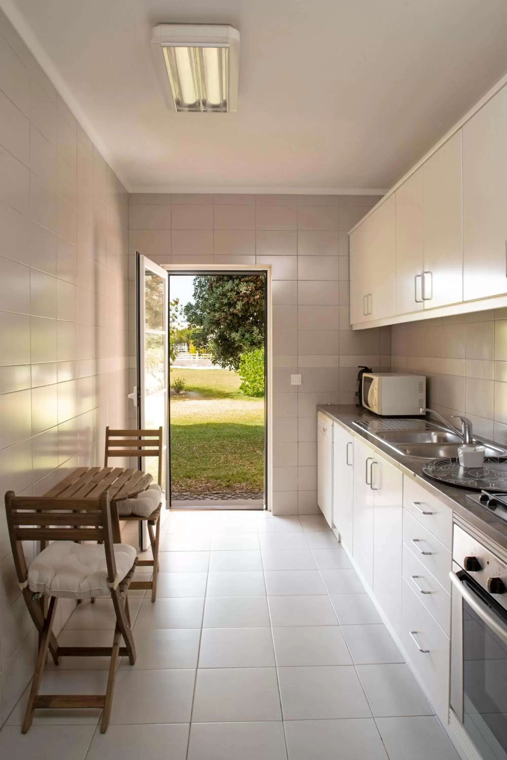 Kitchen or kitchenette in Vila Bicuda Resort