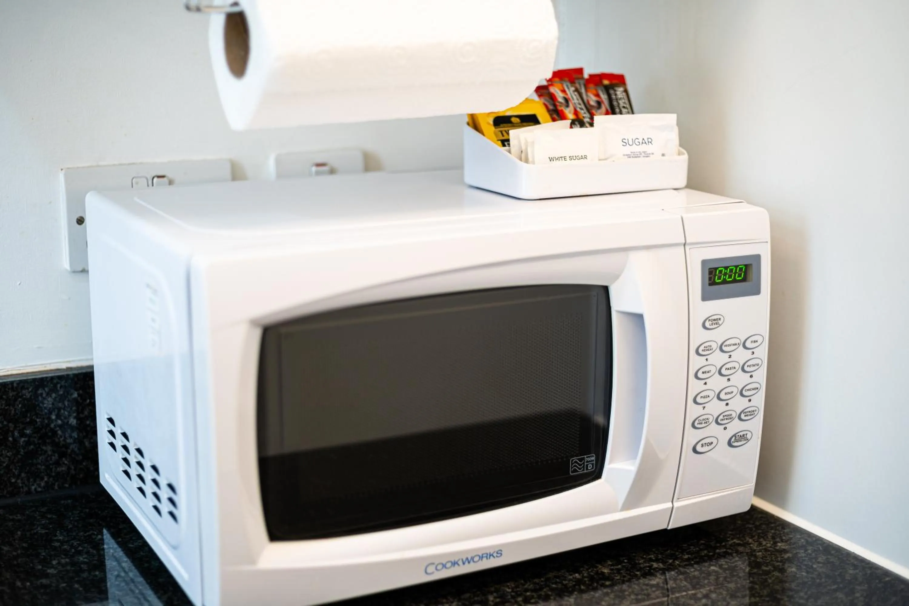 Kitchen or kitchenette, TV/Entertainment Center in Bond Street Serviced Apartment