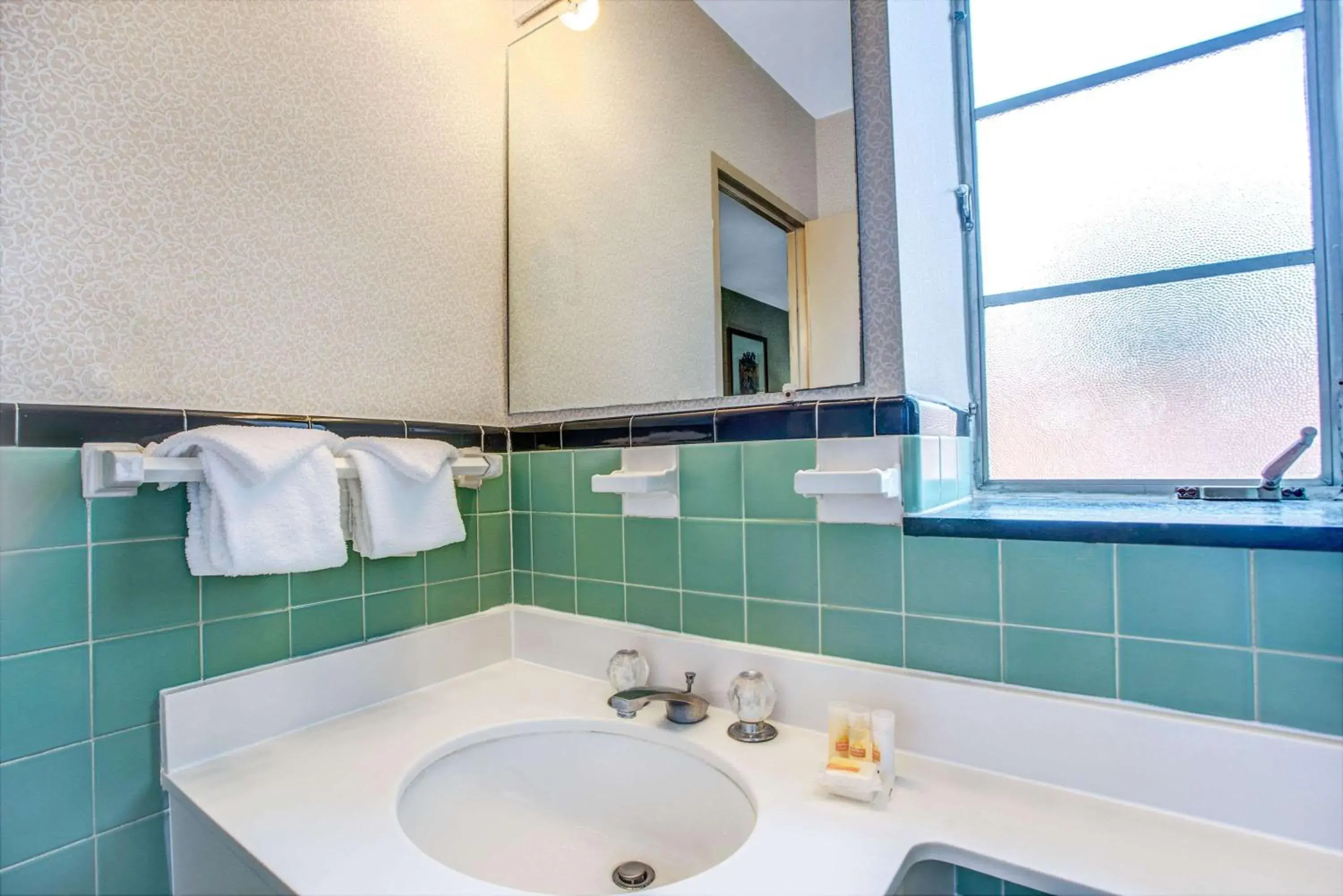 Bathroom in Days Inn by Wyndham Arlington/Washington DC