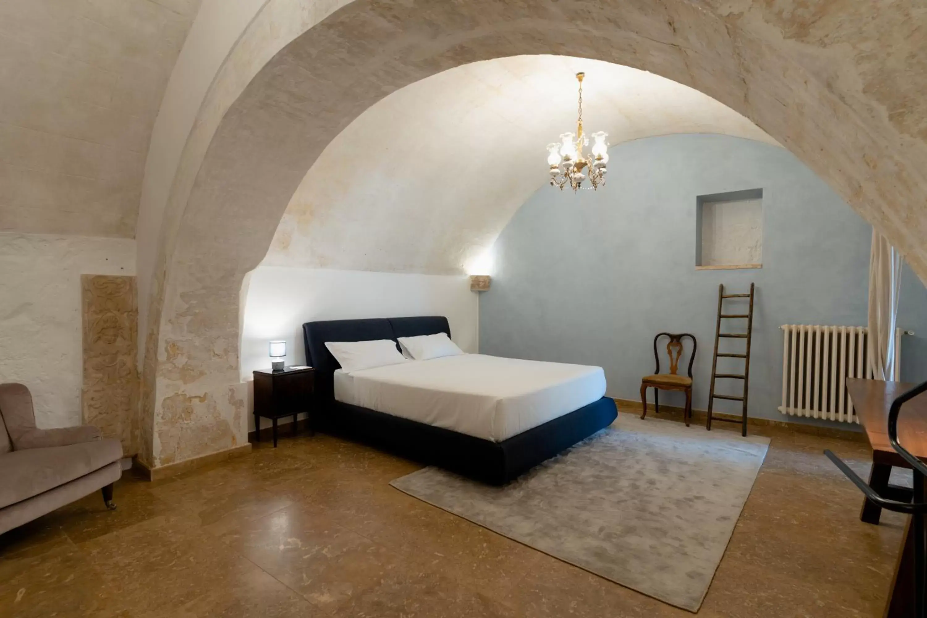 Bed in Palazzo Del Duca Luxury Hotel & Restaurant