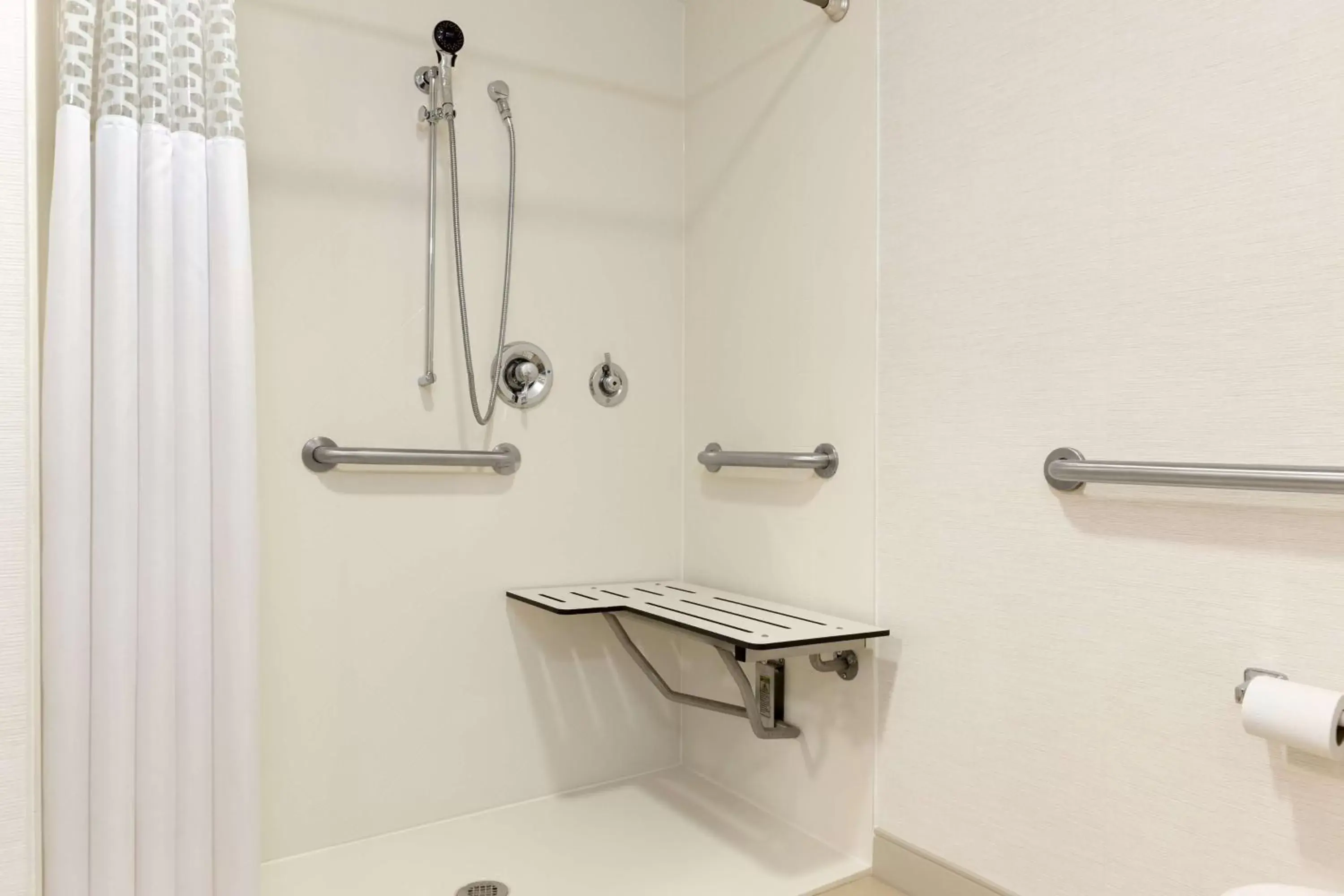 Bathroom in Hampton Inn & Suites by Hilton Manchester Bedford Bathroom in Hampton Inn & Suites by Hilton Manchester Bedford