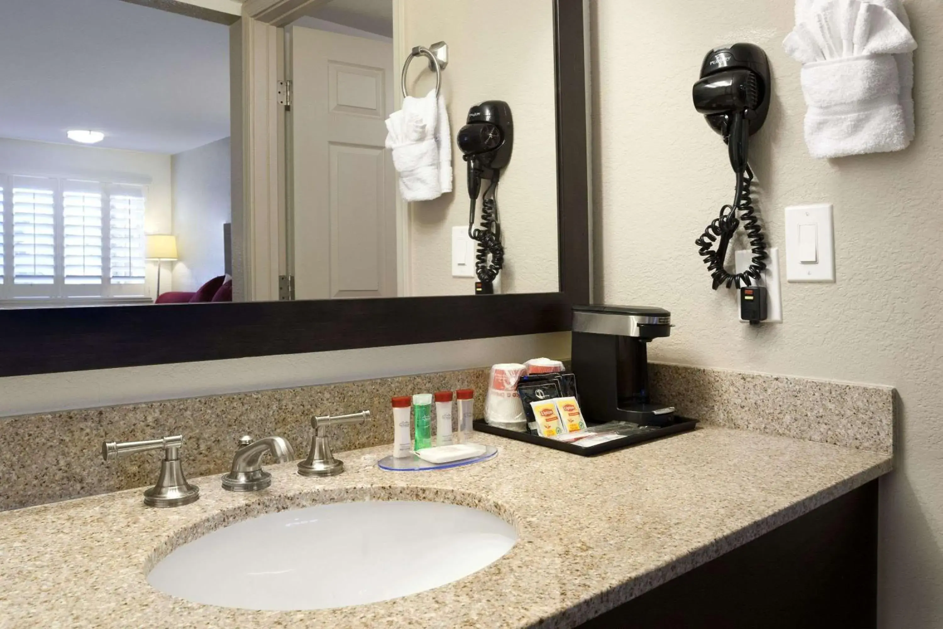 Photo of the whole room, Bathroom in Ramada by Wyndham Tempe/At Arizona Mills Mall