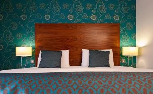 Bed in The Boleyn Hotel