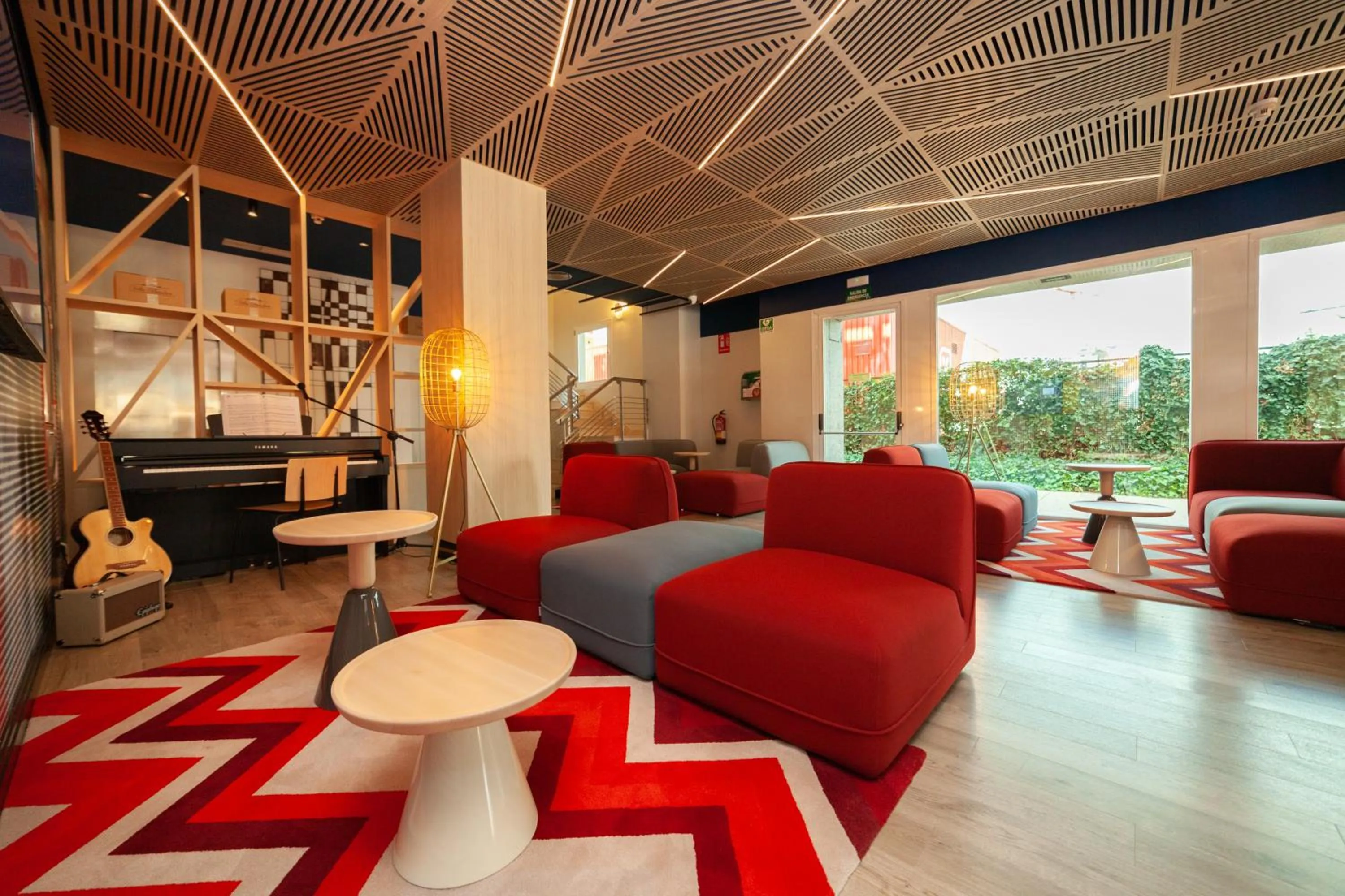Lobby or reception in Ibis Alcala de Henares La Garena
