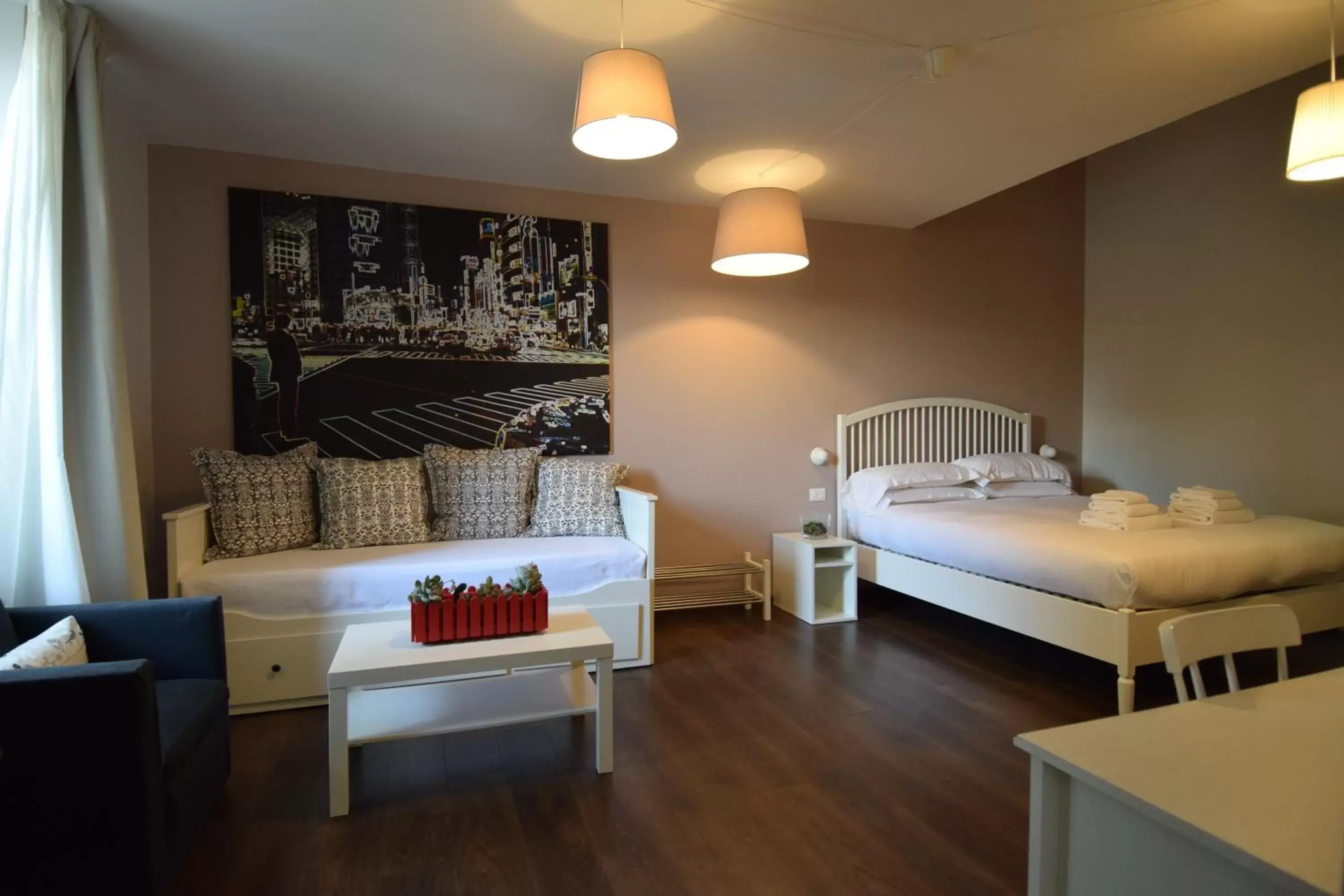 Luxury Quadruple Room - single occupancy in Il Giardino