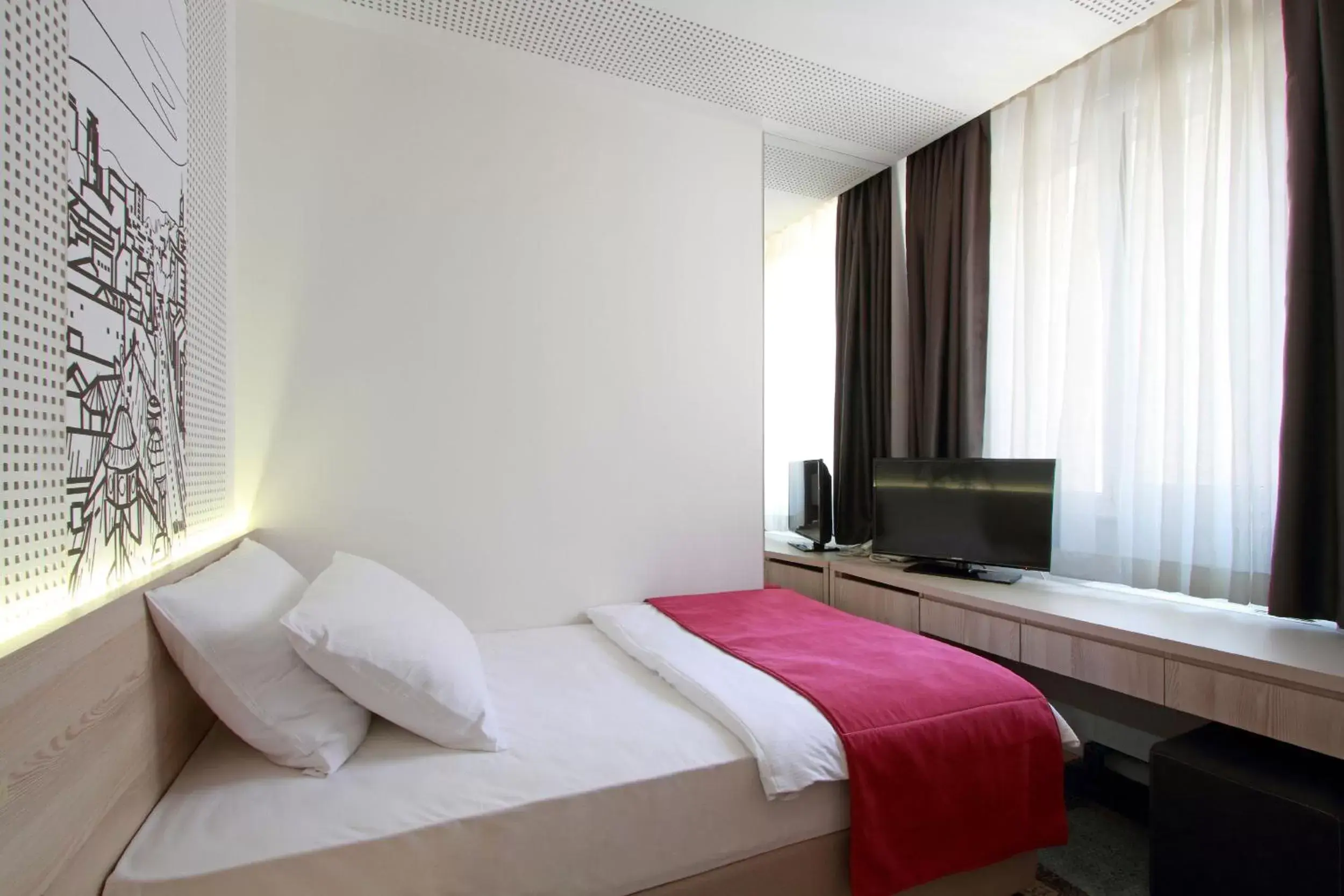 Bed in Hotel Cosmopolit Bed in Hotel Cosmopolit