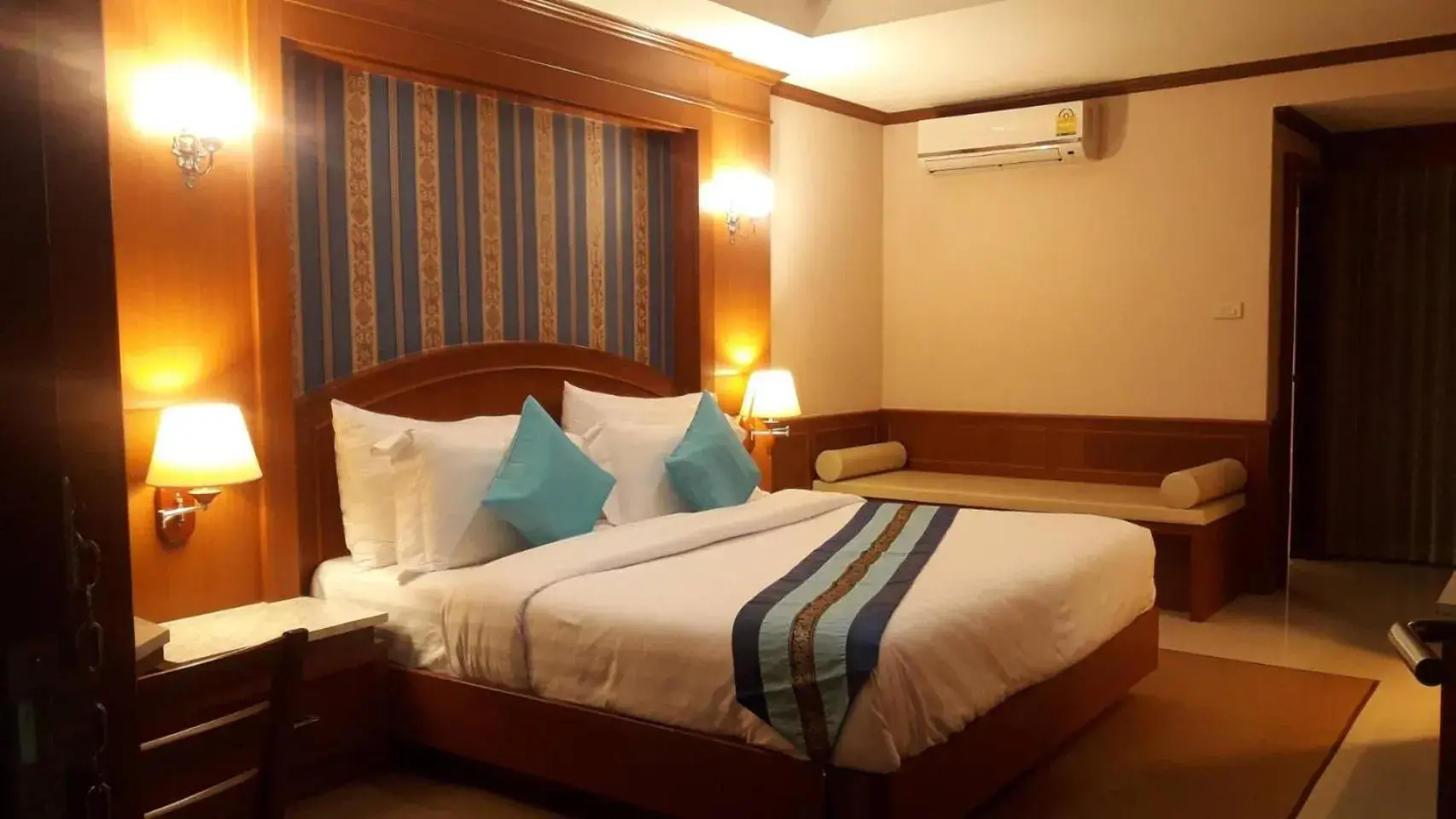 Bed in The Lion King Hotel Udonthani Bed in The Lion King Hotel Udonthani