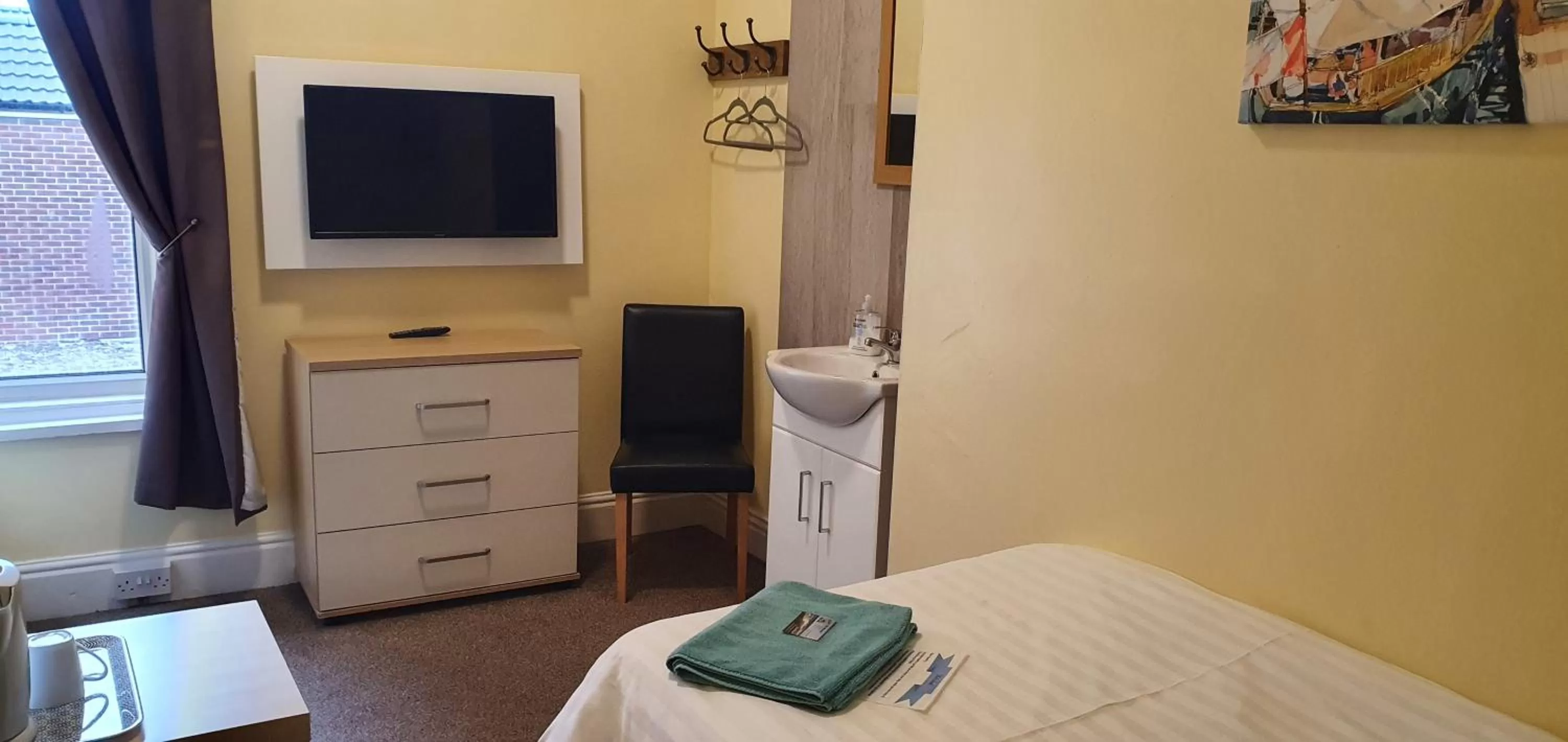 TV and multimedia, TV/Entertainment Center in The Beacon Hotel