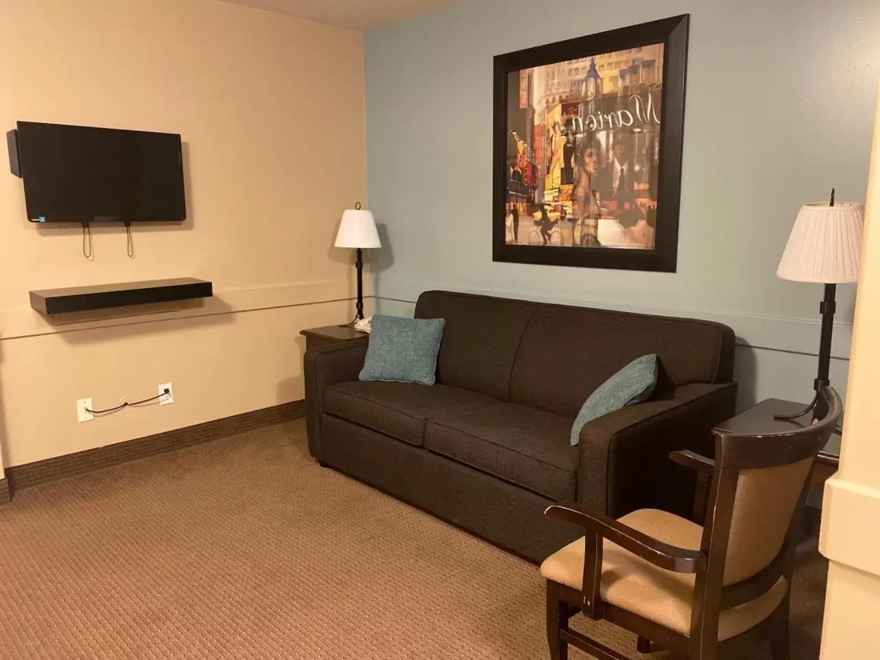 Living room in Super 8 by Wyndham Edmonton South