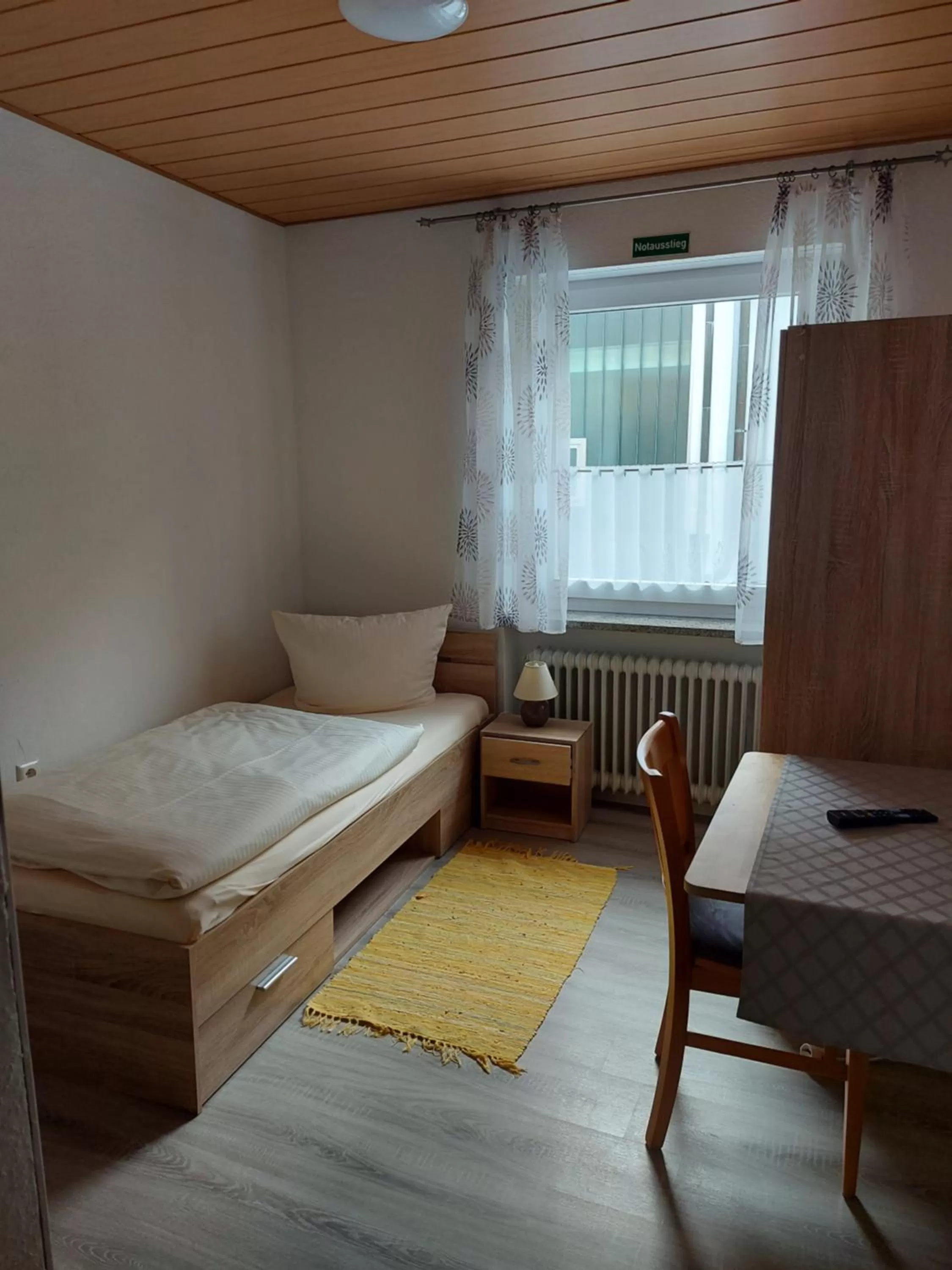 Bed in Gasthof Pension Weißes Rössl