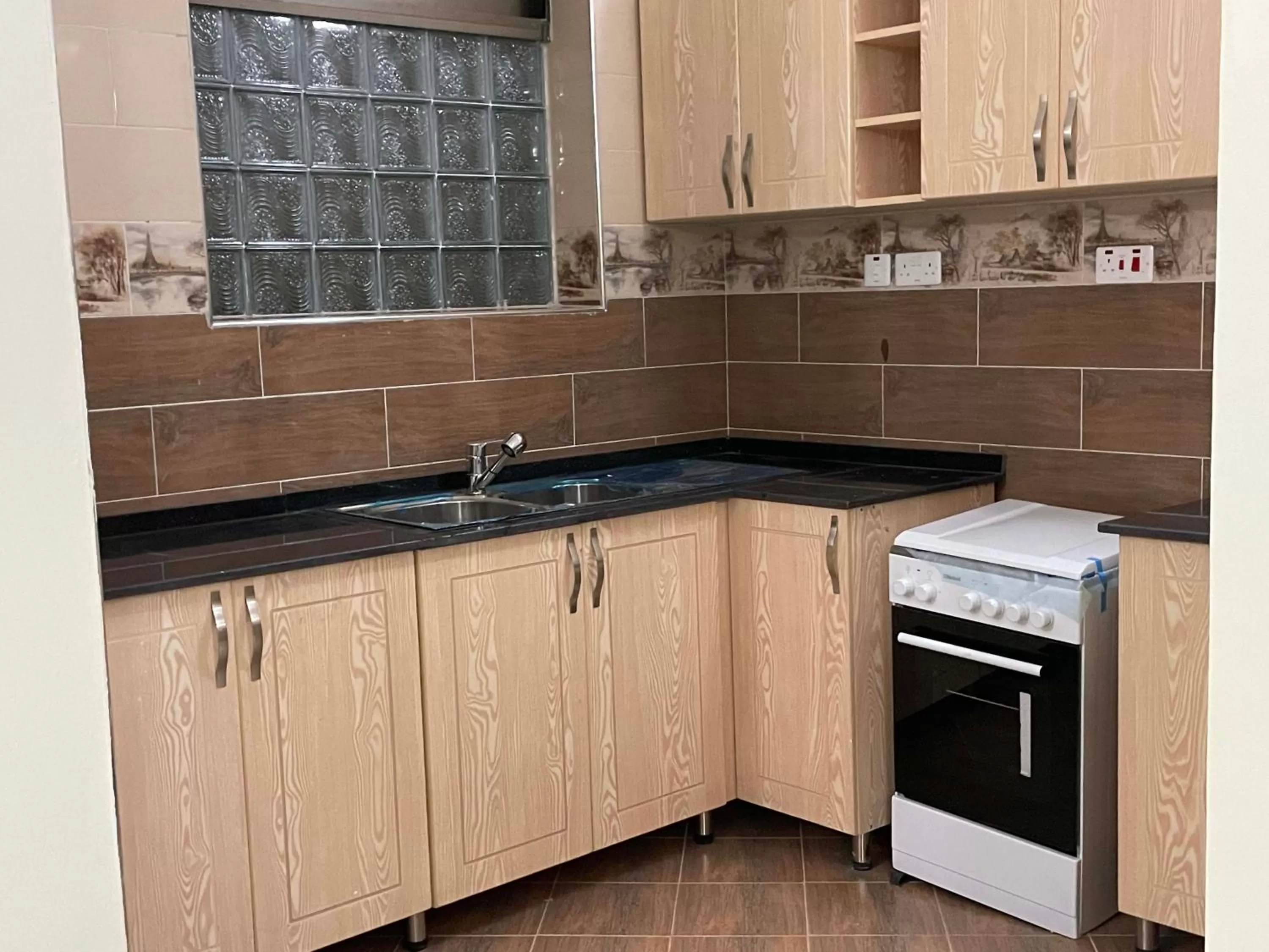 Kitchen or kitchenette in Jaffa Suites