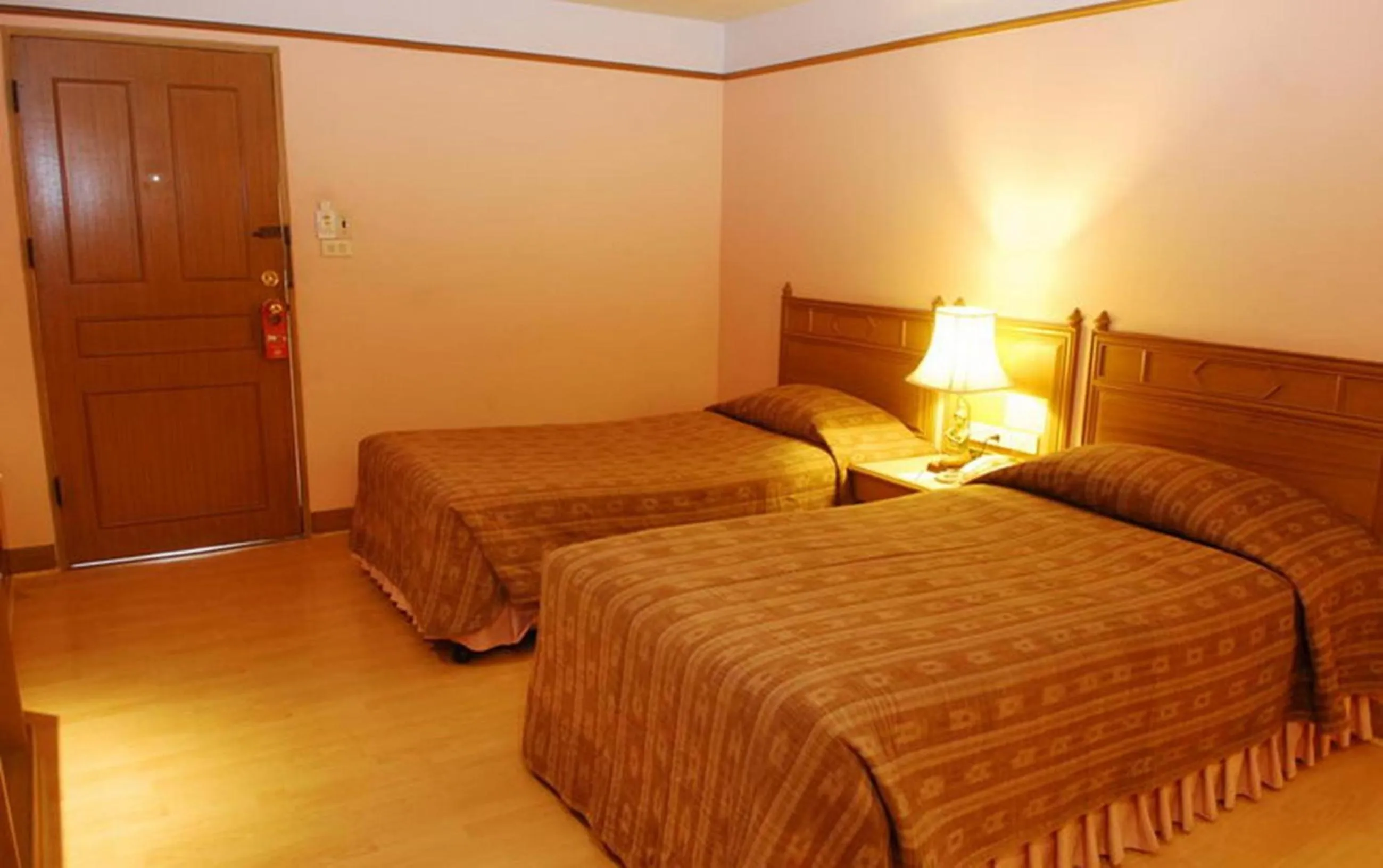 Bed in Silom Village Inn