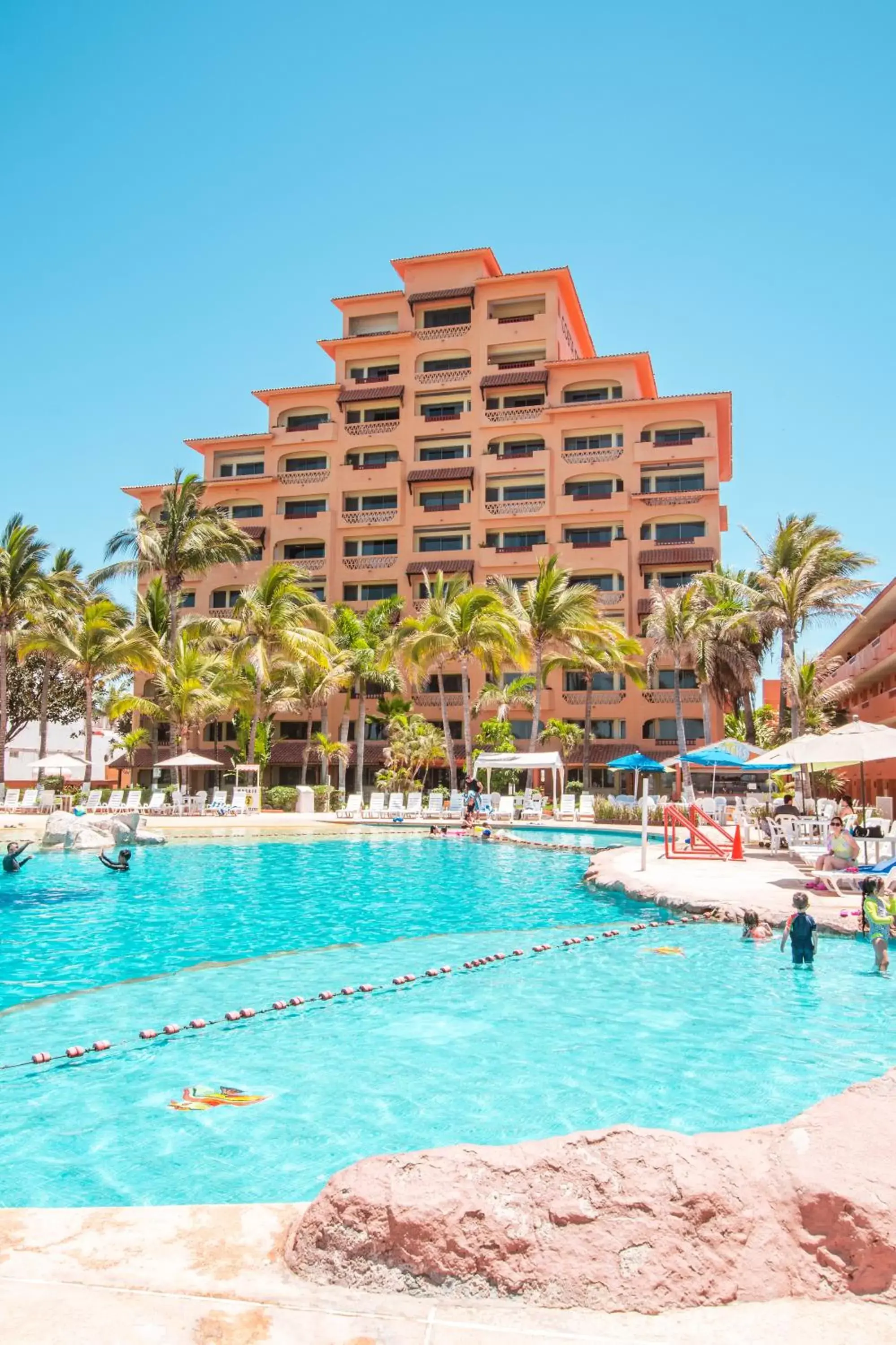 Swimming pool, Property Building in Costa de Oro Beach Hotel