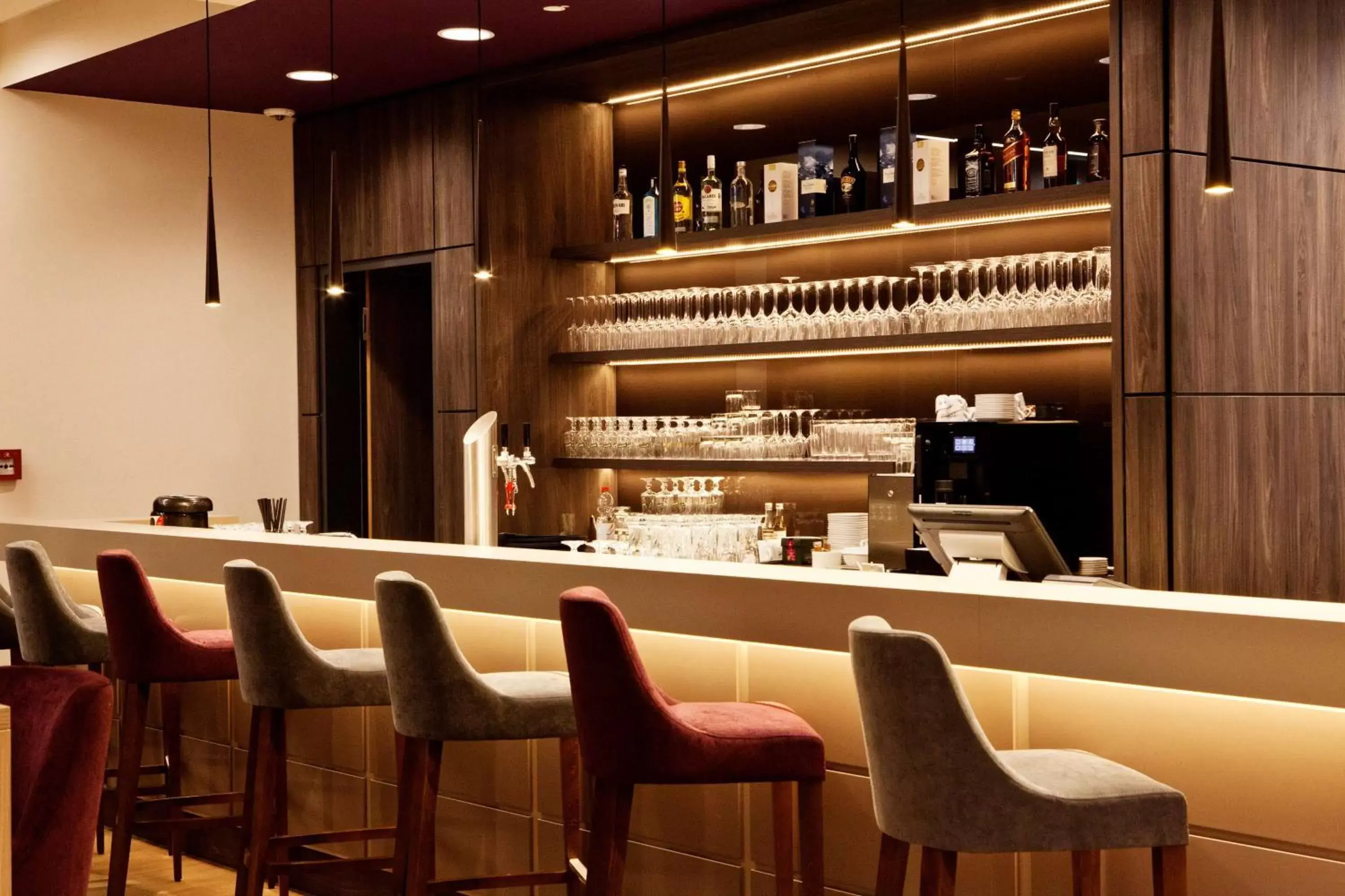 Lounge or bar in Hampton By Hilton Dortmund Phoenix See Lounge or bar in Hampton By Hilton Dortmund Phoenix See
