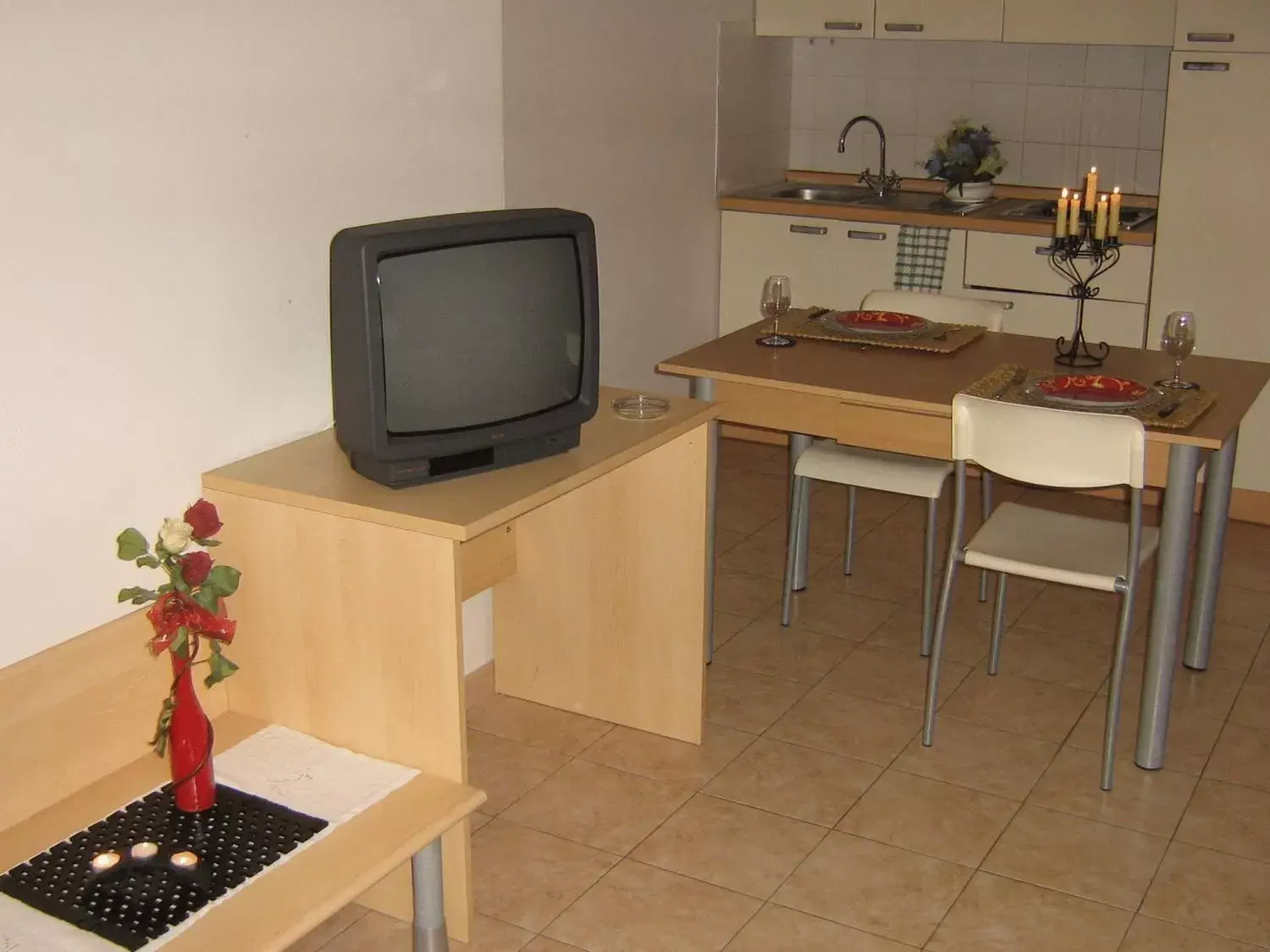 Kitchen or kitchenette, TV/Entertainment Center in Residenza San Giovanni