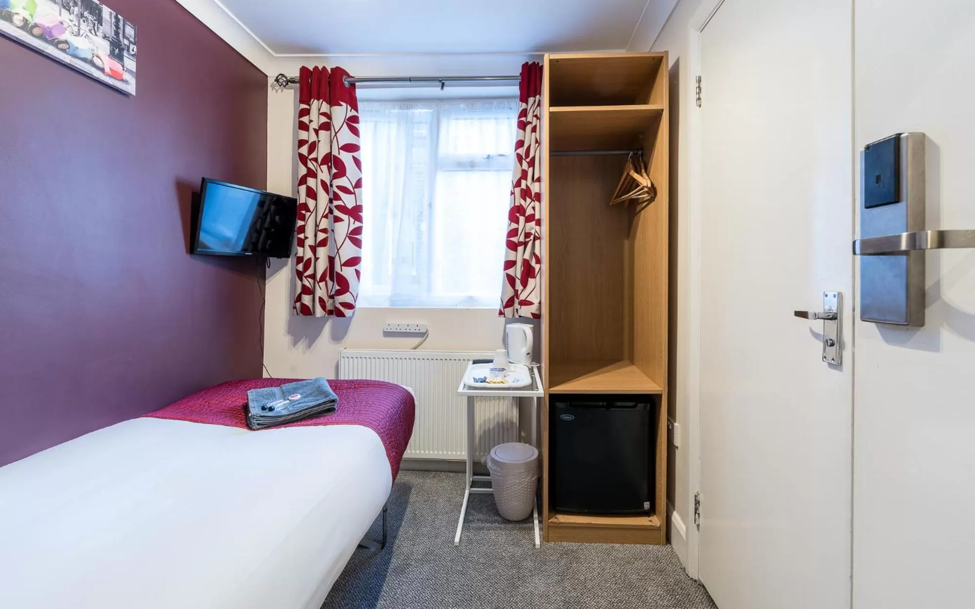 TV/Entertainment Center in Hellenic Hotel by Saba