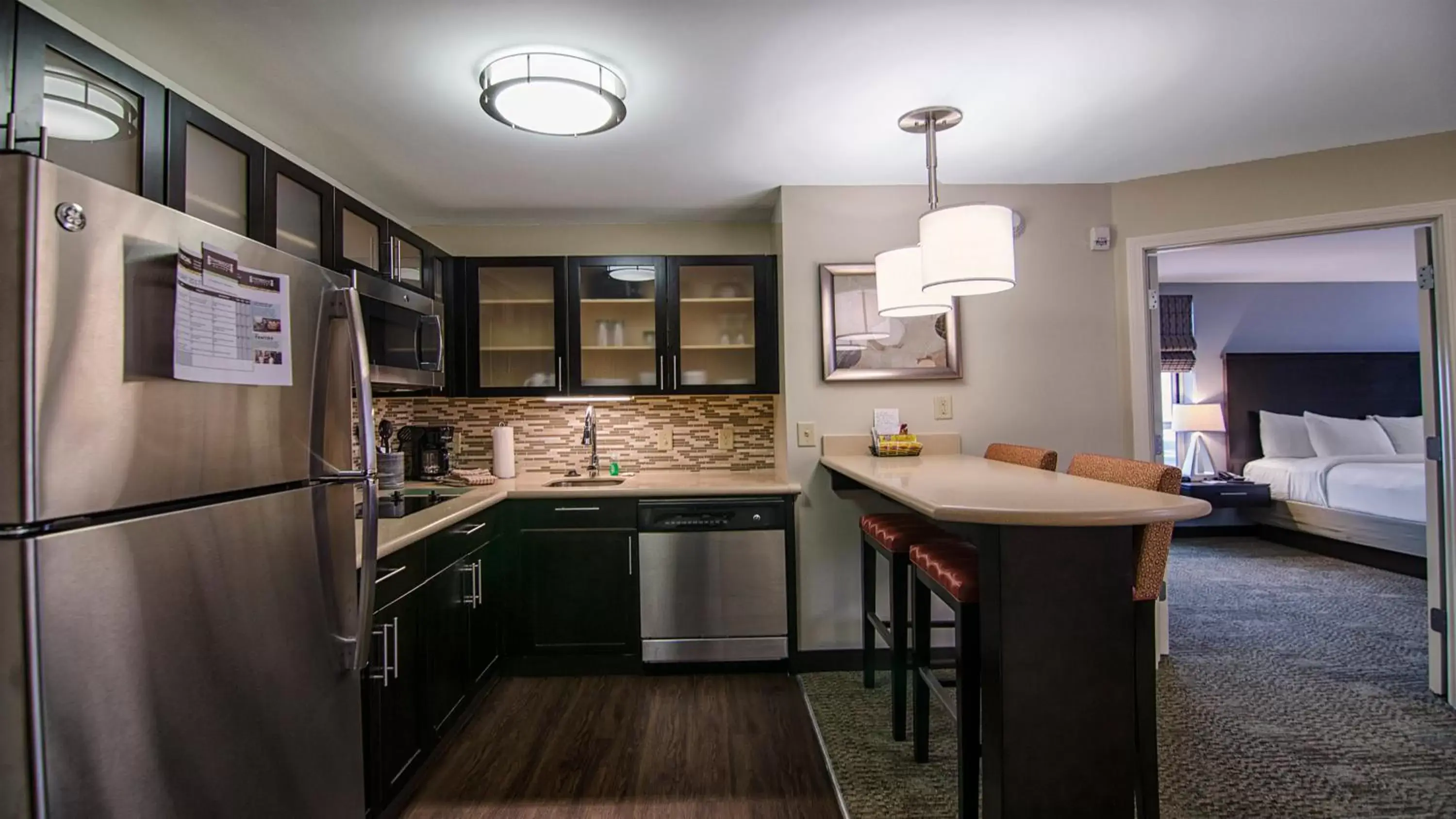 Photo of the whole room, Kitchen/Kitchenette in Staybridge Suites Marquette, an IHG Hotel