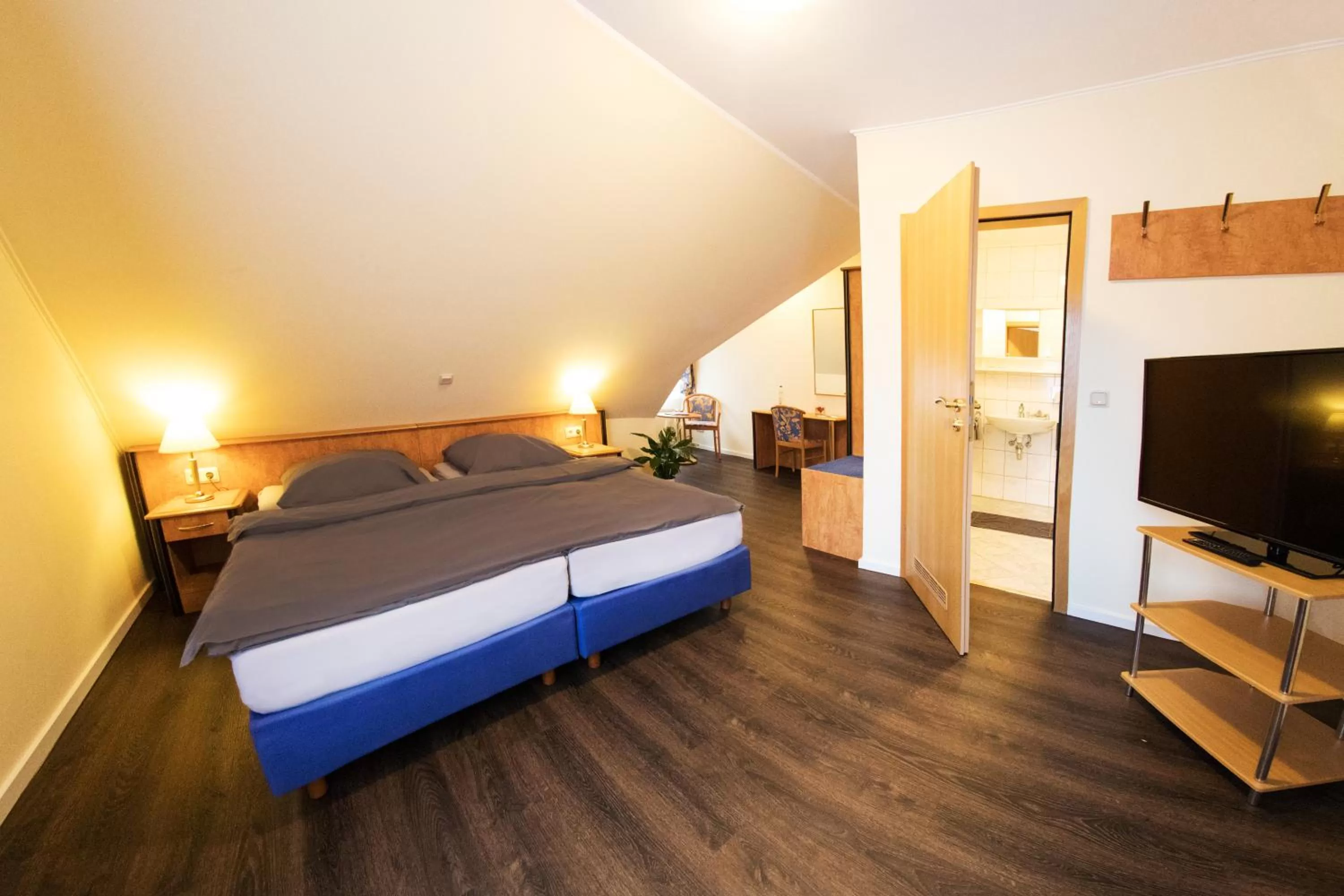 Bedroom, Bed in Hotel Restaurant Waldlust