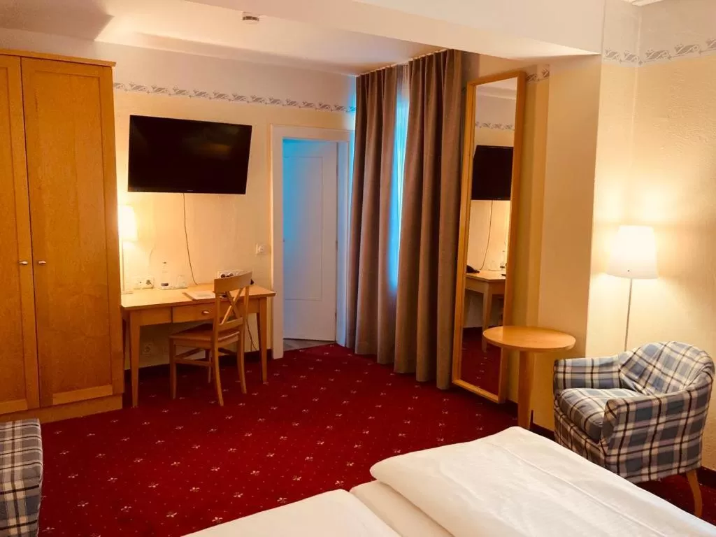 Bed in Hotel Rosenheimer Hof