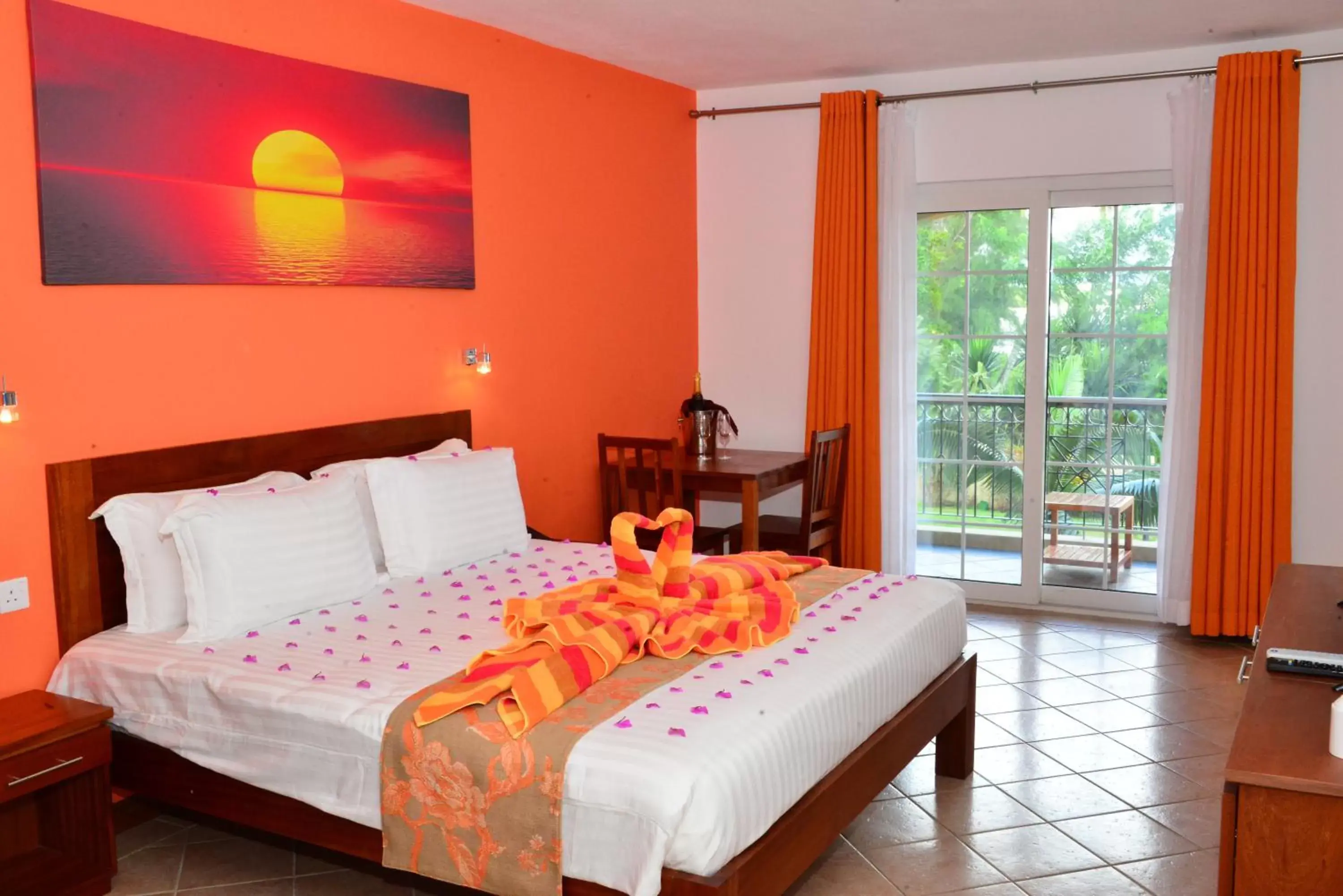 Bed in Sunset Reef Resort & Spa