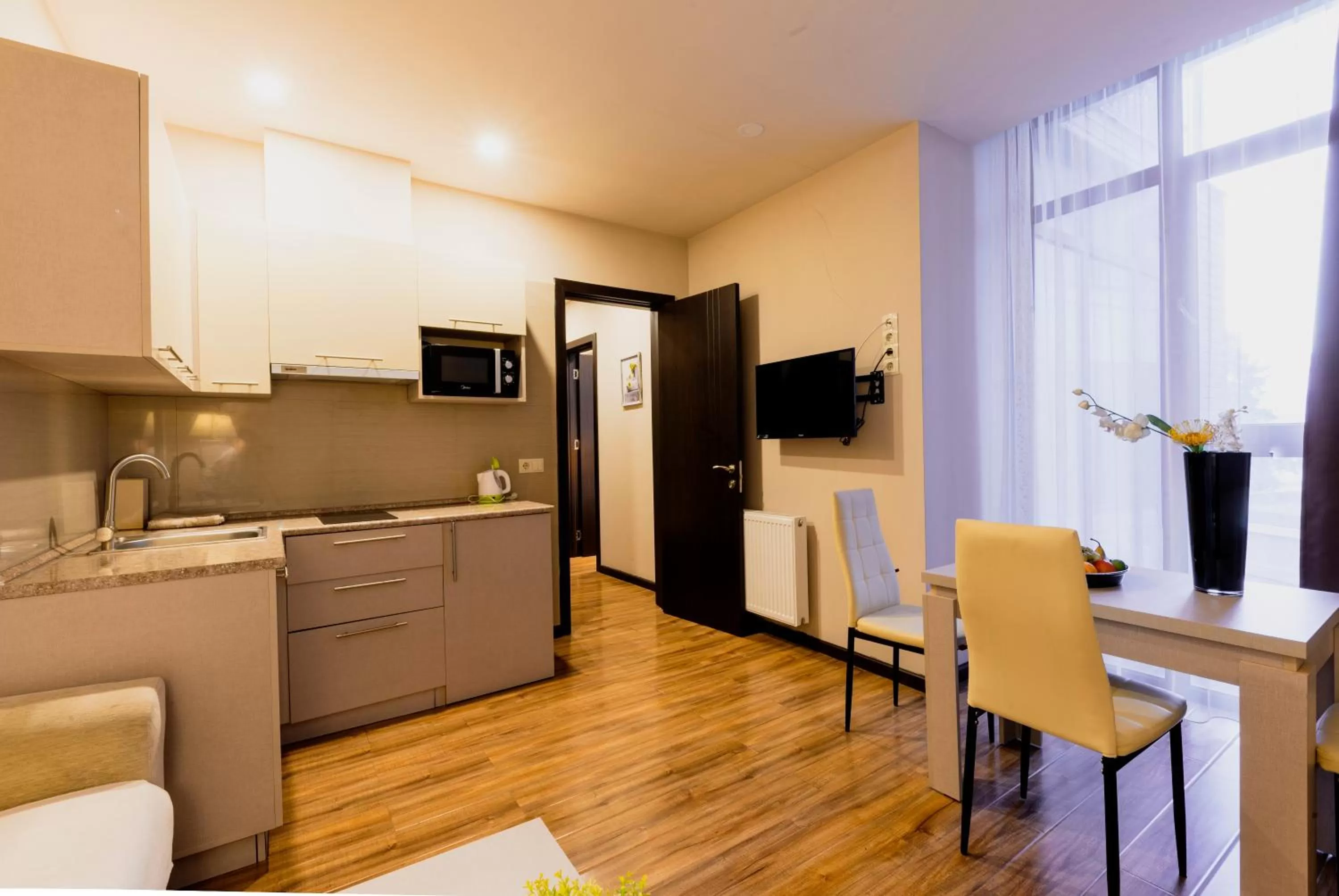 Living room in Sani Apart Hotel