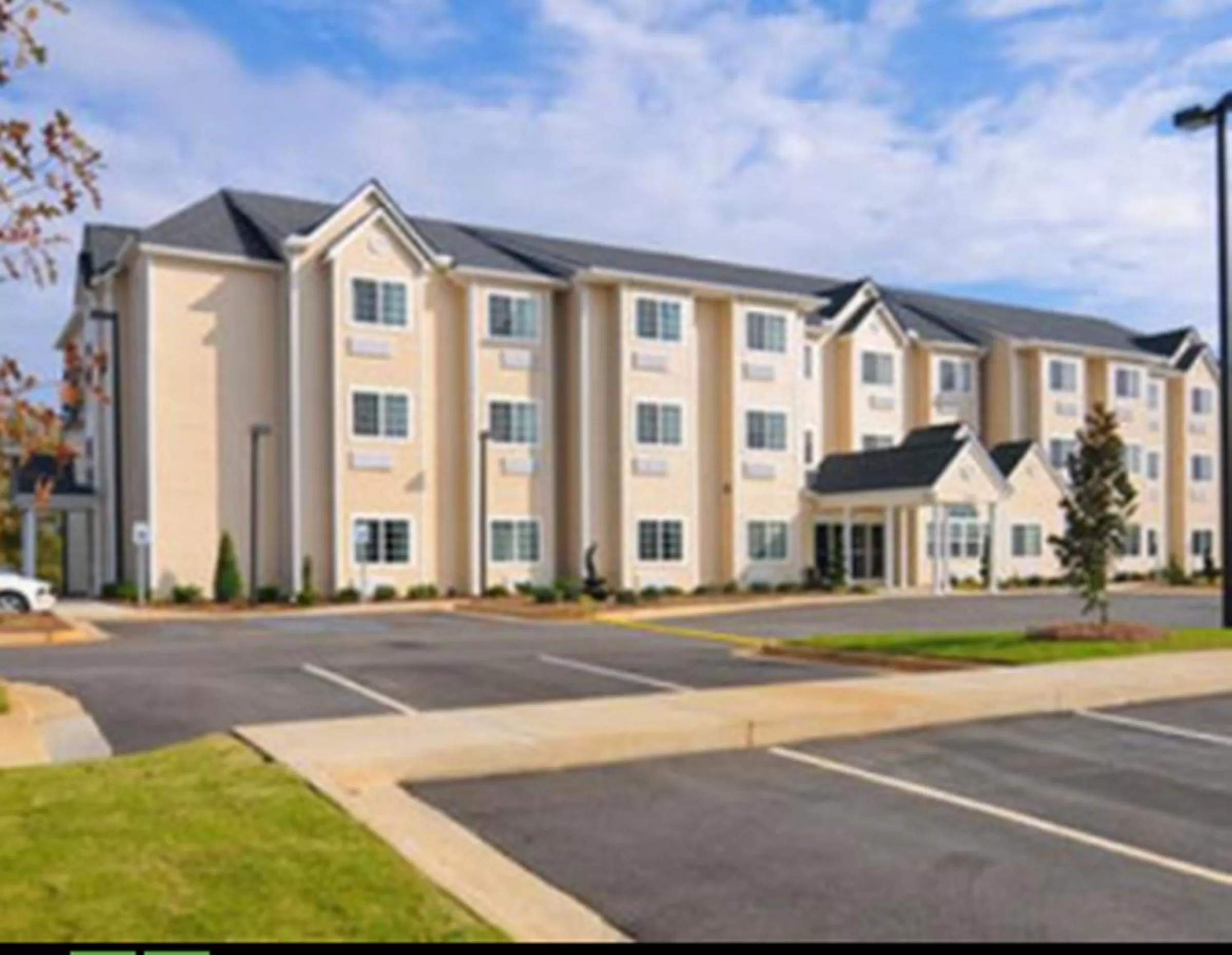 Property building in Microtel Inn & Suites by Wyndham Ozark