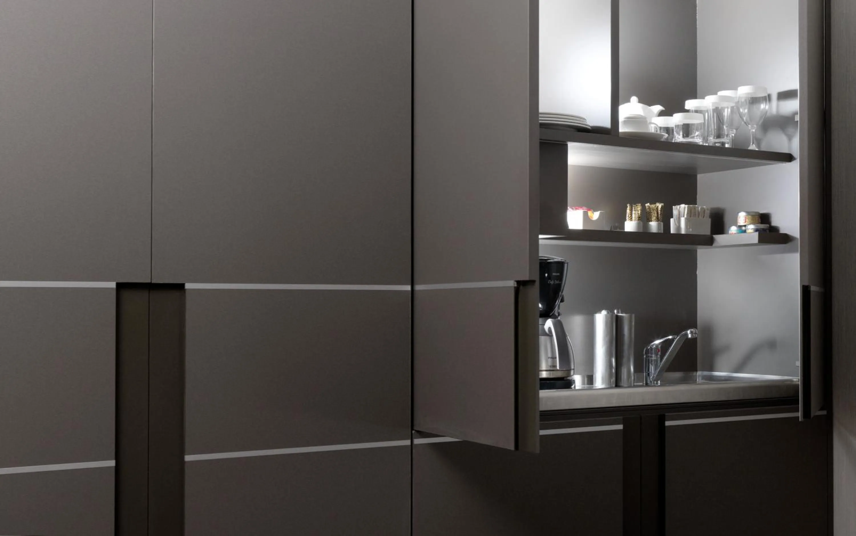 Kitchen or kitchenette in Holiday Suites