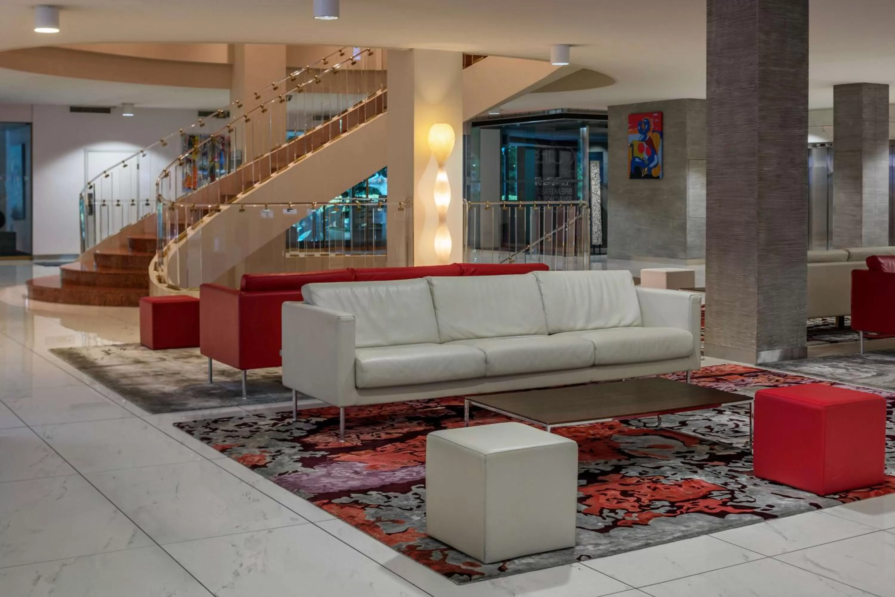 Lobby or reception in Hilton Geneva Hotel and Conference Centre