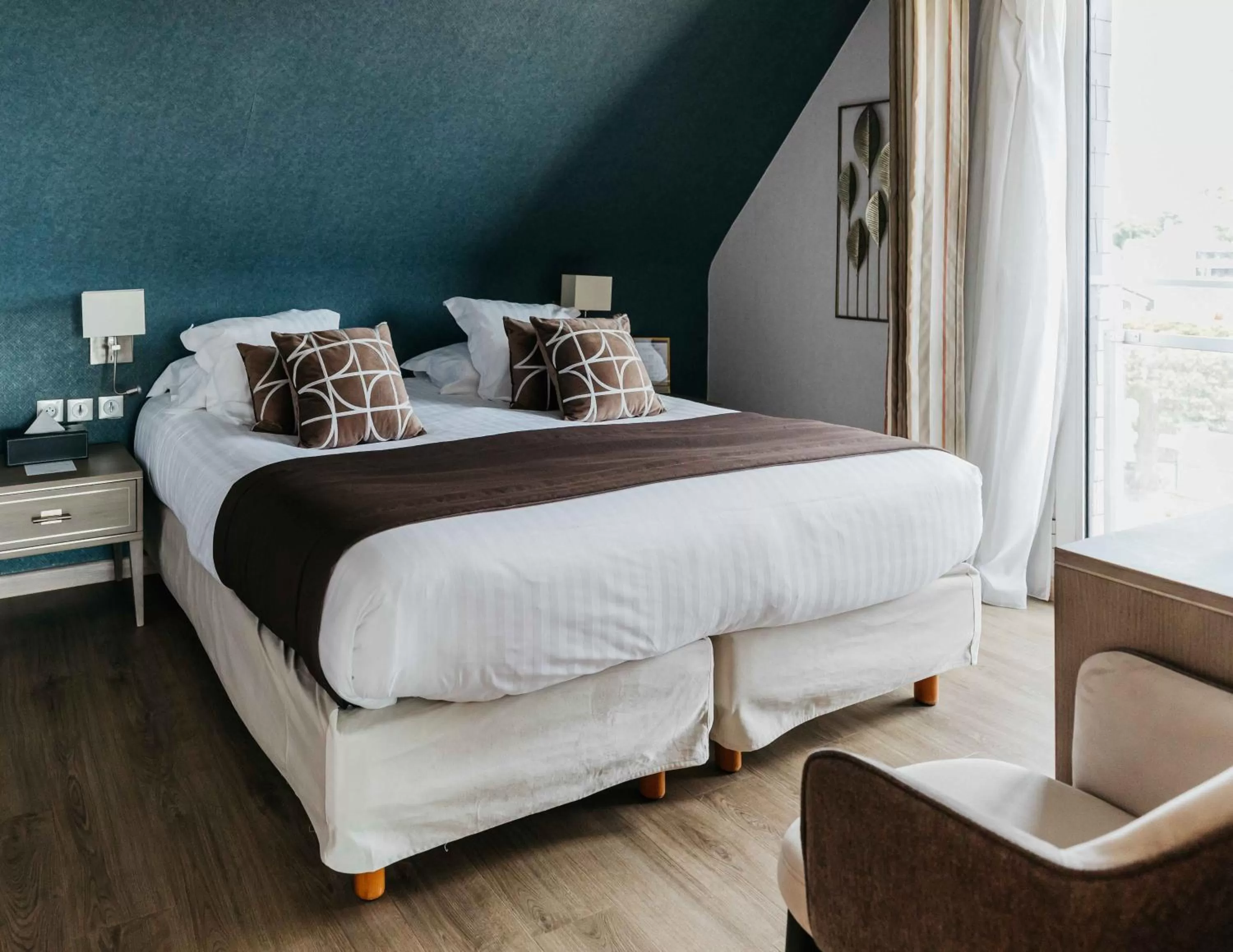 Bed in Le Diana Hôtel & Spa