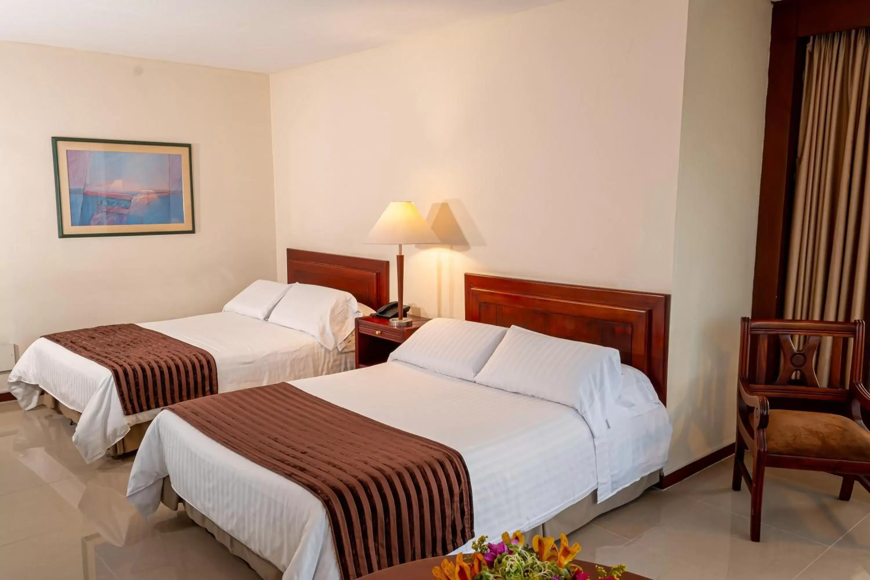 Bed in Torre de Cali Plaza Hotel