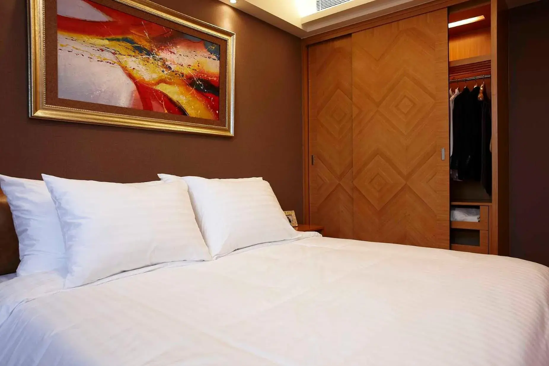 Bed in Dan Executive Hotel Apartment Zhujiang New Town