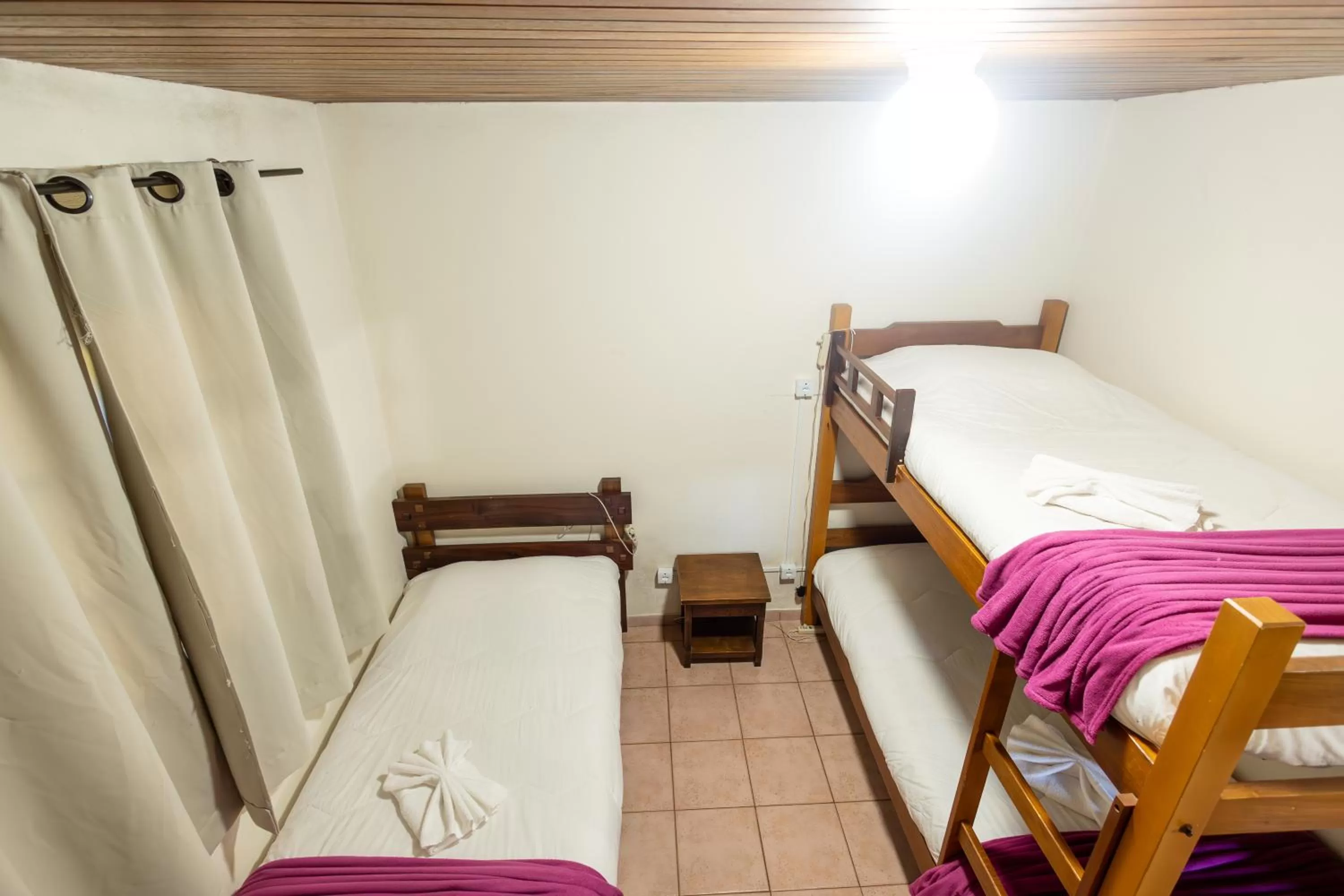 Bed in Pousada 3 Pinheiros