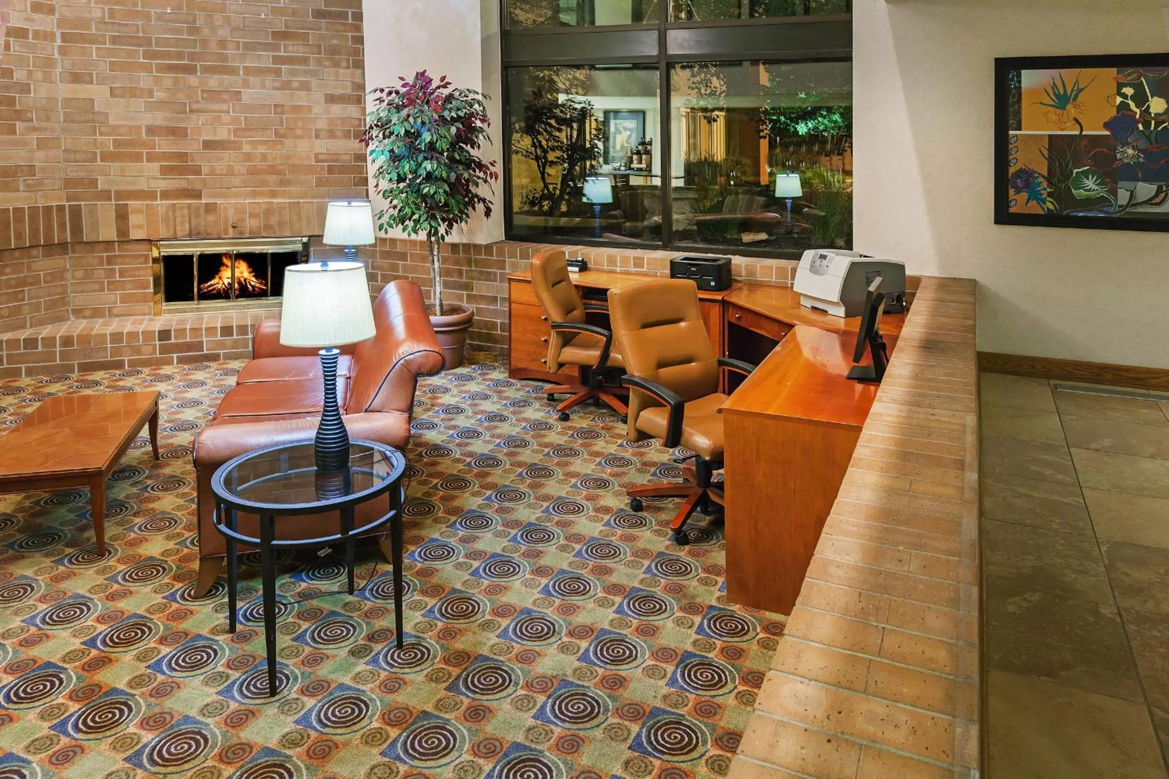 Lobby or reception in AmericInn by Wyndham Omaha
