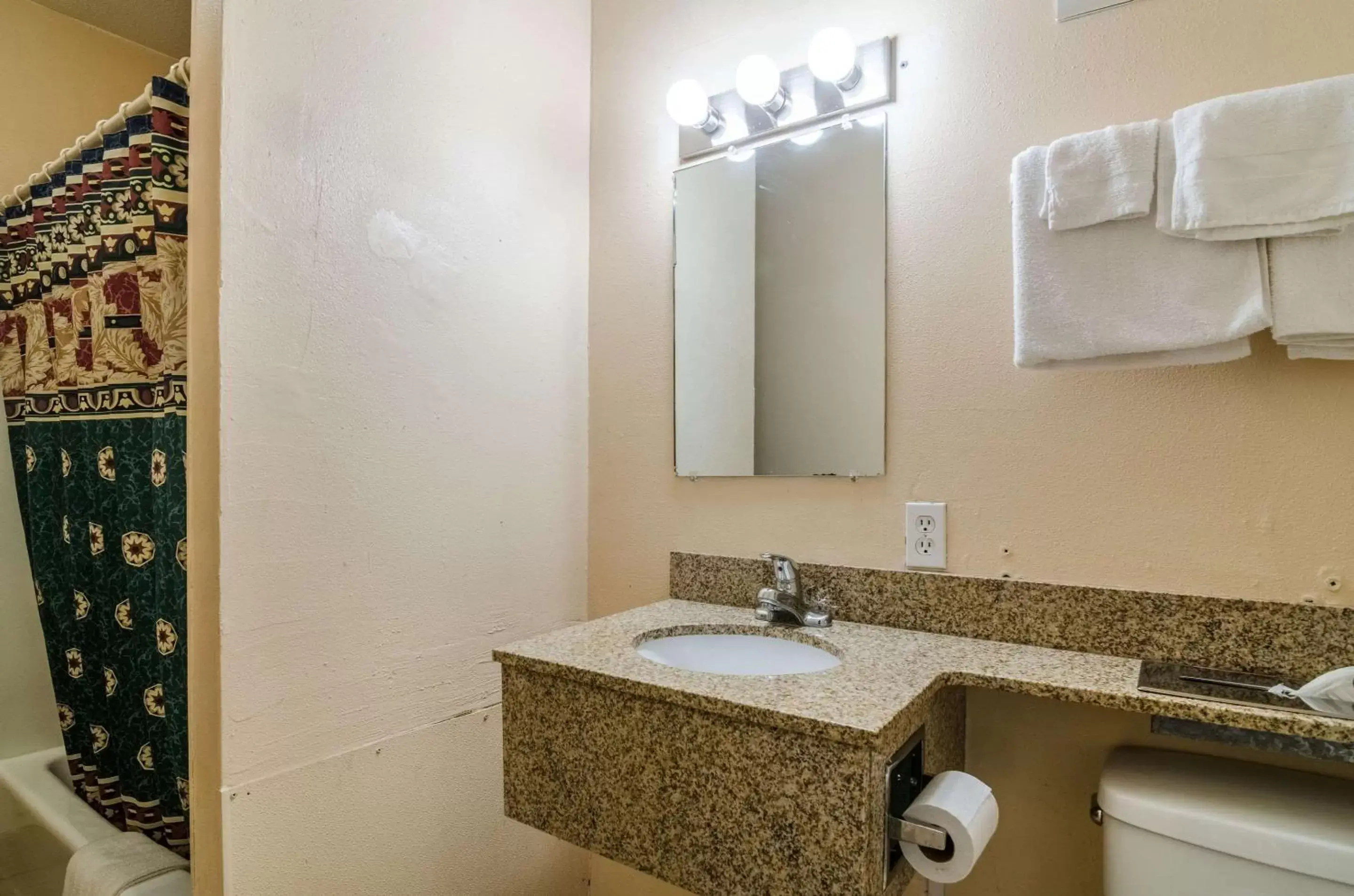 Photo of the whole room, Bathroom in Executive Inn Dodge City, KS