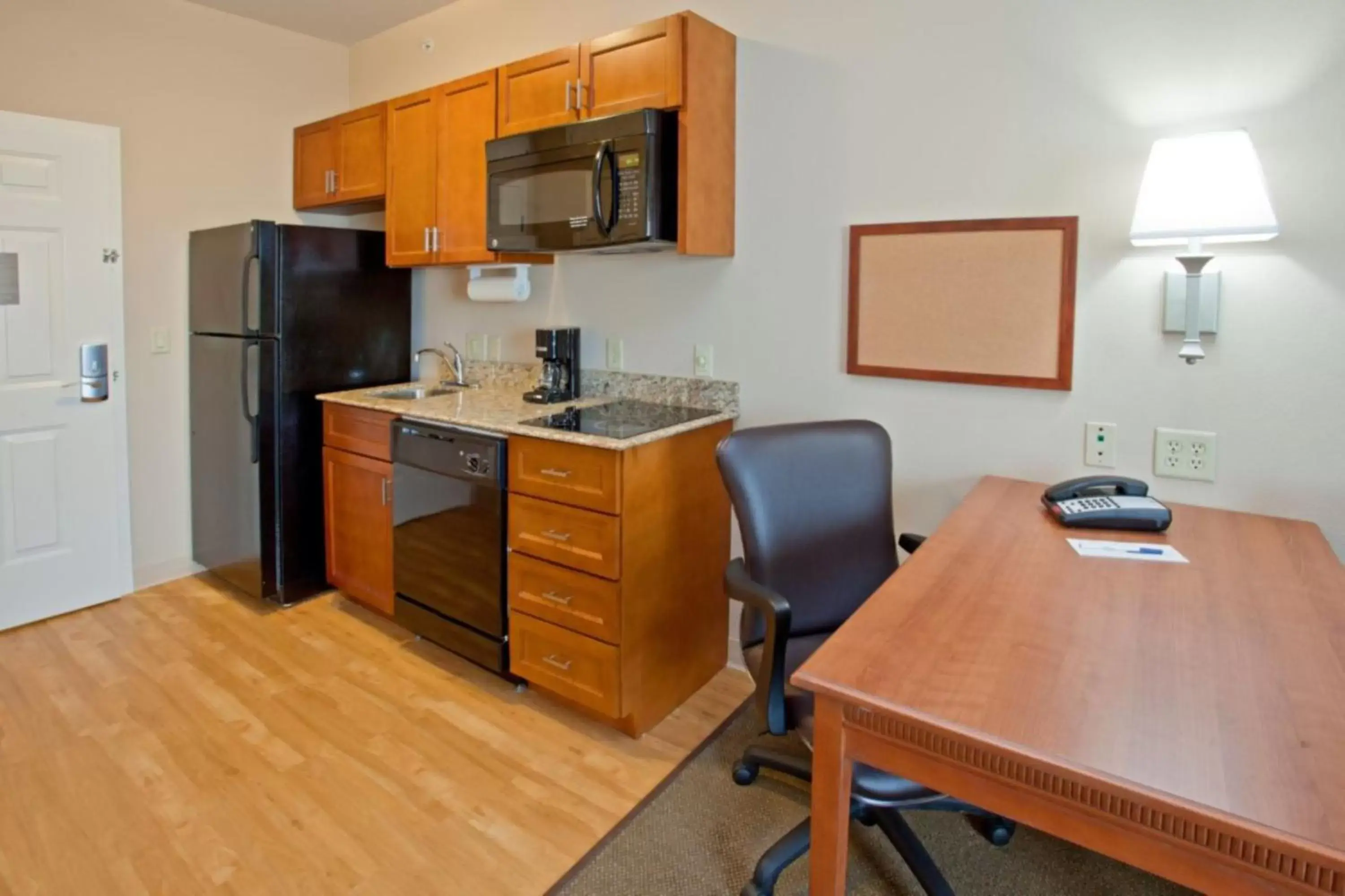 Photo of the whole room, Kitchen/Kitchenette in Candlewood Suites League City, an IHG Hotel