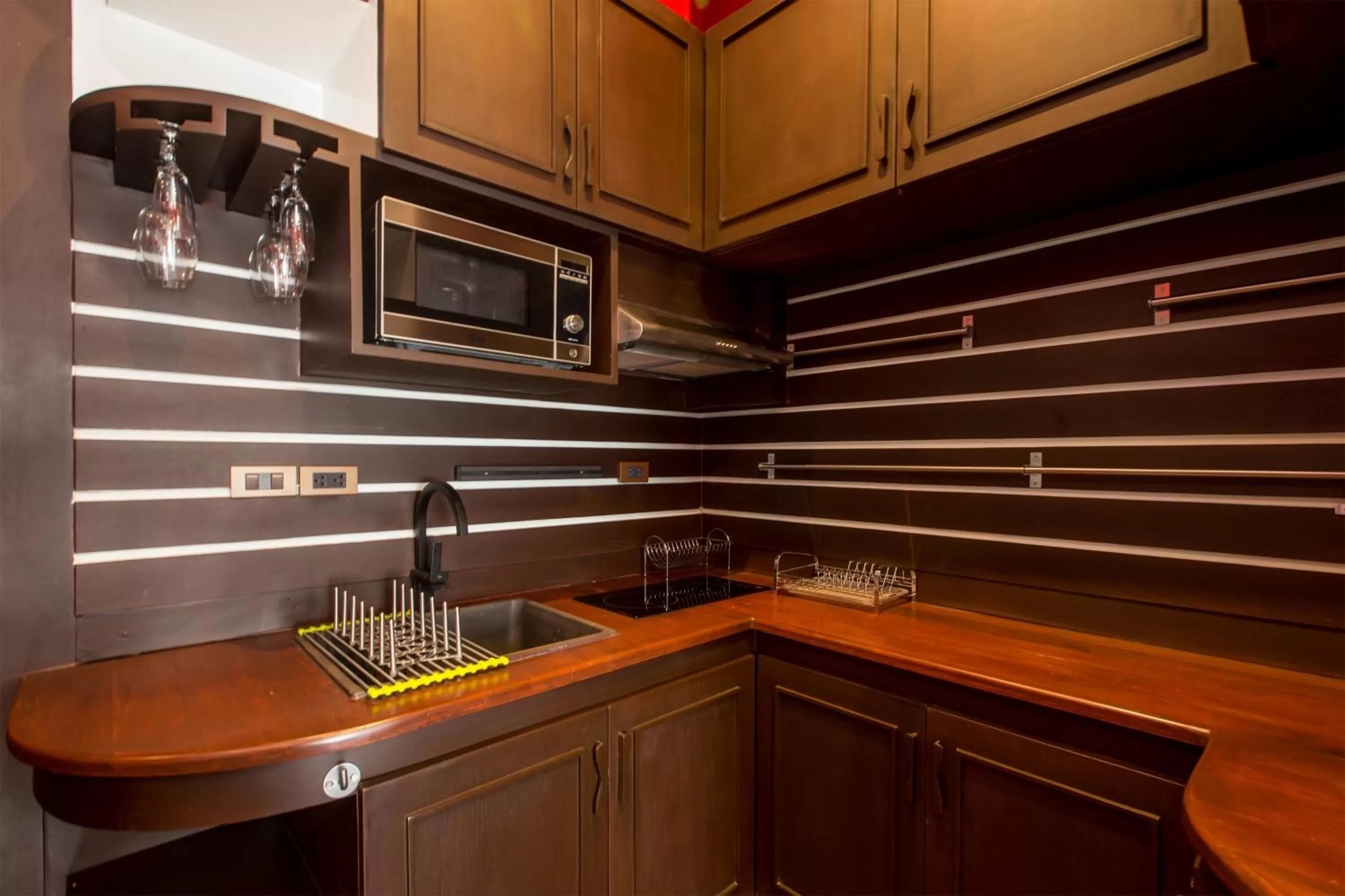 Kitchen or kitchenette in De Sarann Villa